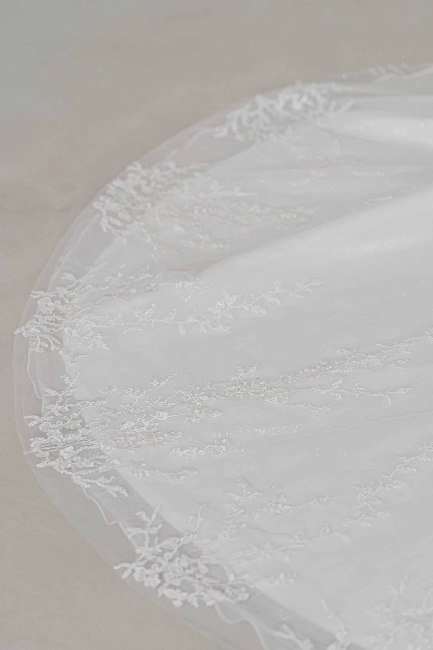 Alivia bridal gown featuring a delicate floral lace train