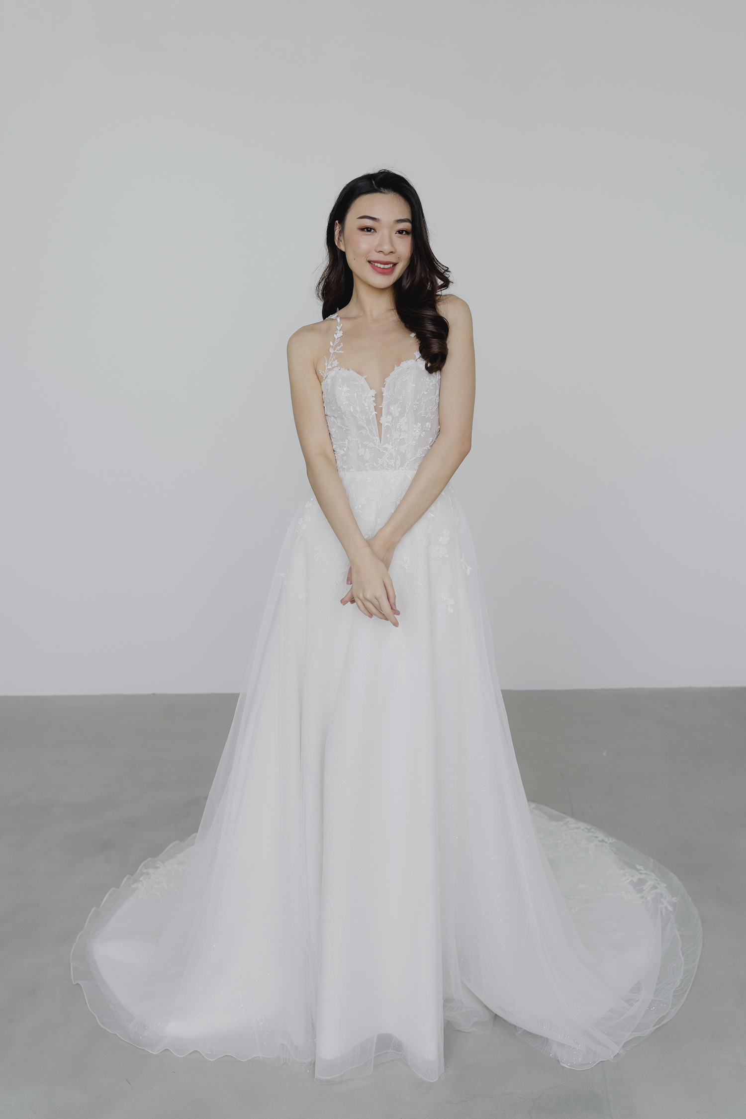 Alivia wedding gown featuring a soft A-line silhouette and floral lace bodice
