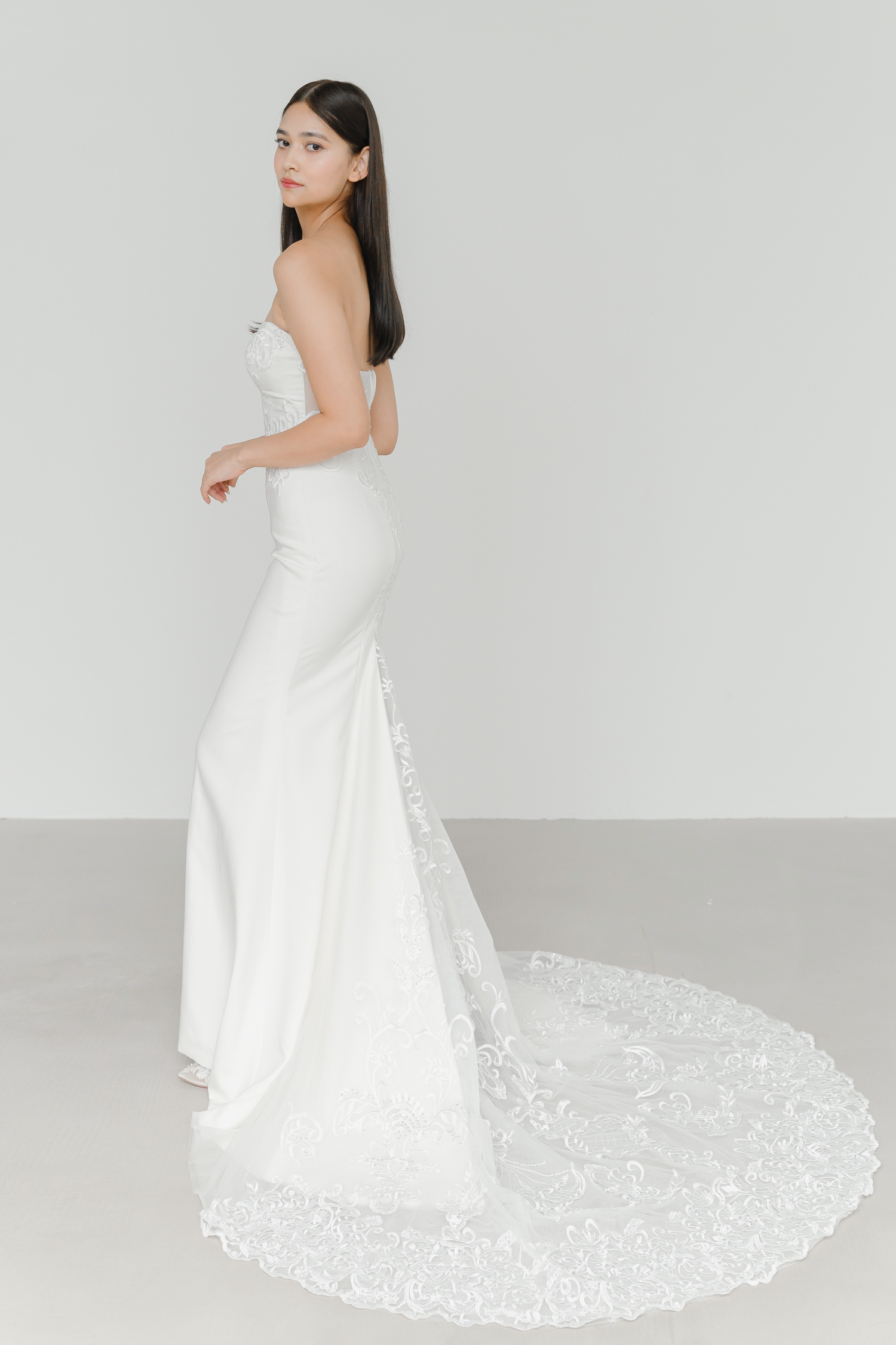 Audrey bridal gown side view with a clean fitted silhouette