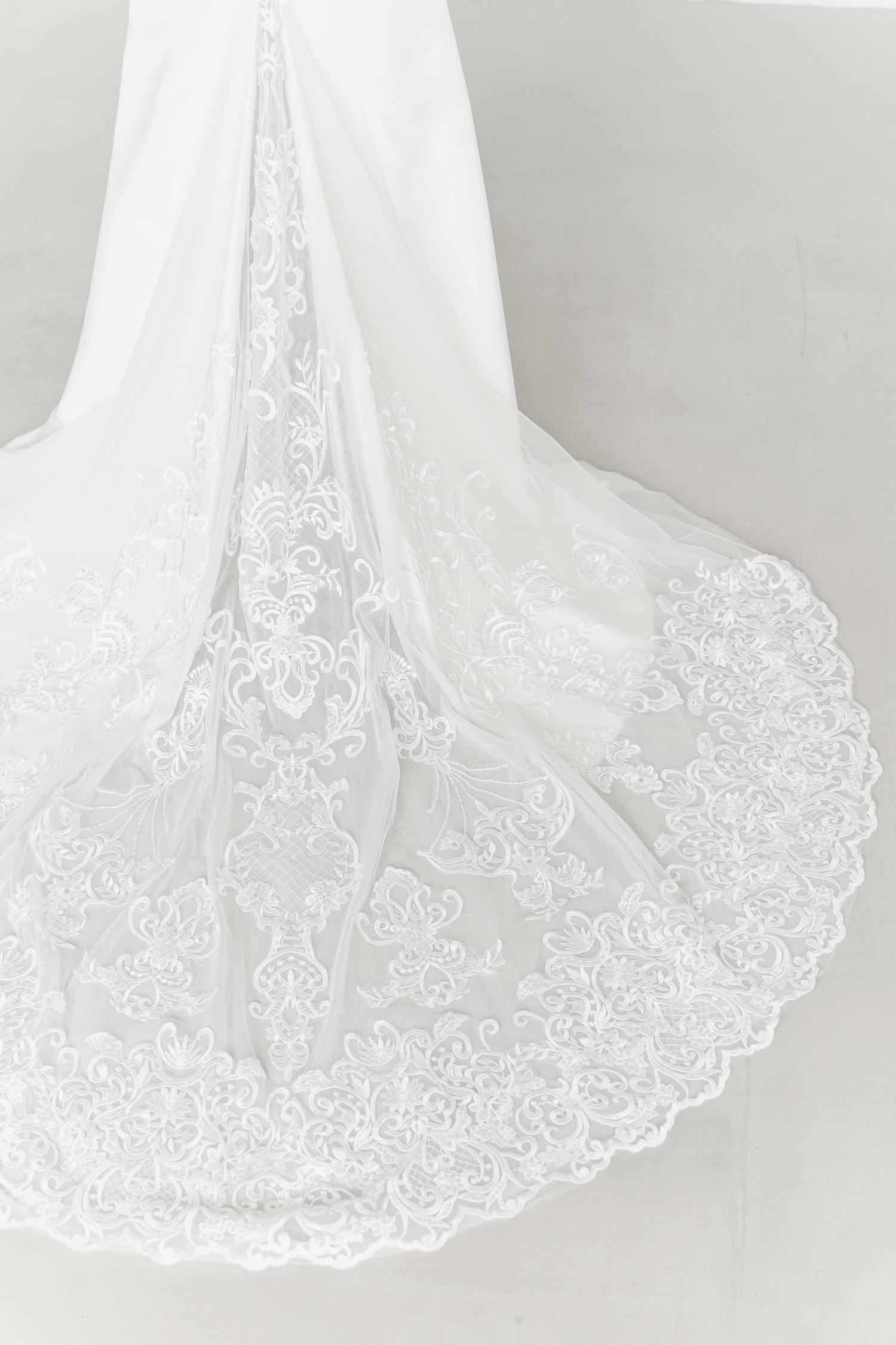 Audrey wedding dress featuring a peekaboo lace train