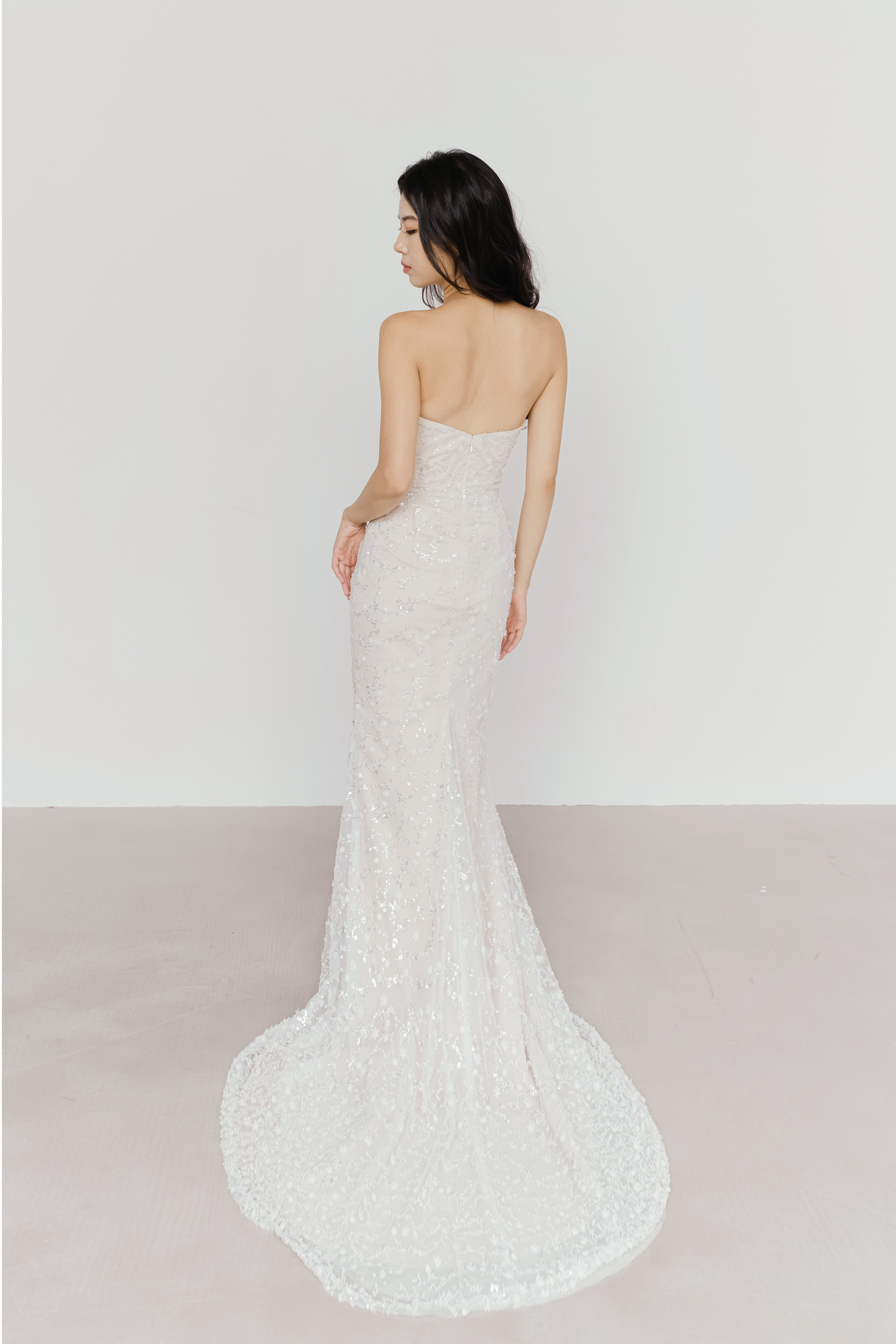 Aurelia wedding dress back view with intricate beaded detailing