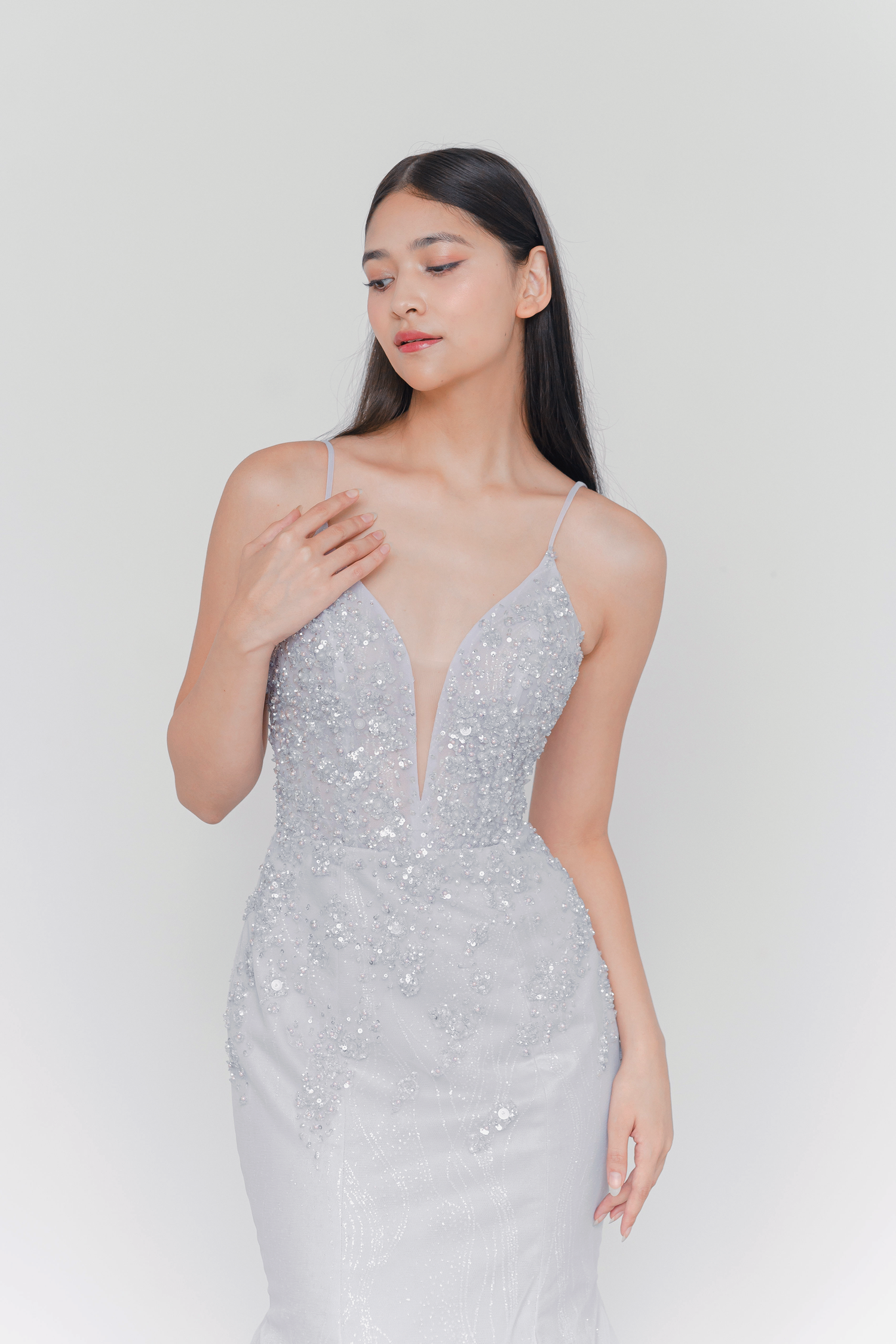 Bailey evening dress featuring a plunging neckline and sculpted mermaid silhouette