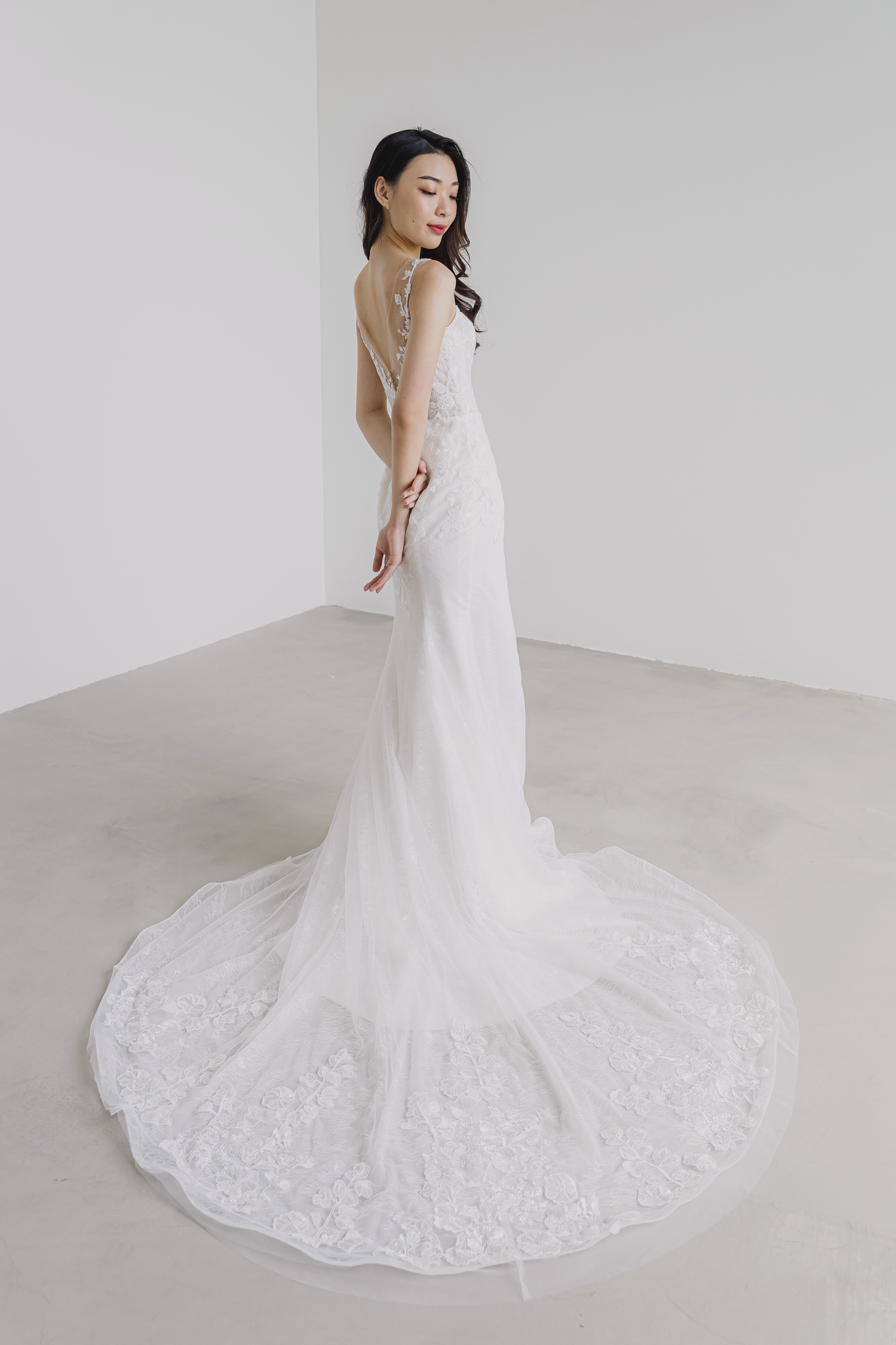 Bethany wedding dress side view with a fitted silhouette