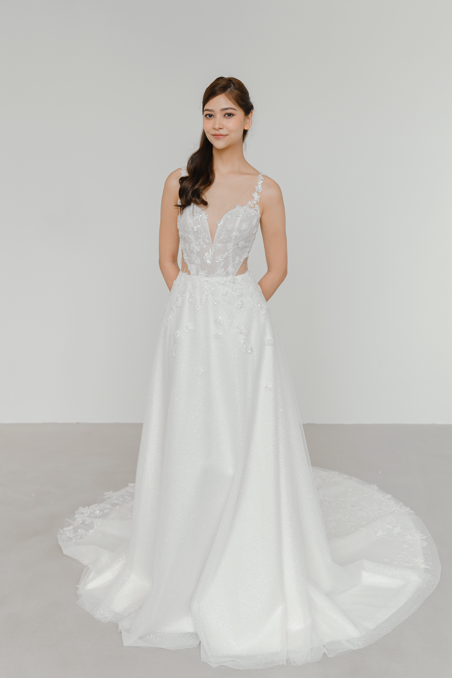 Calsida wedding dress front view with beaded lace and a glitter tulle A-line silhouette
