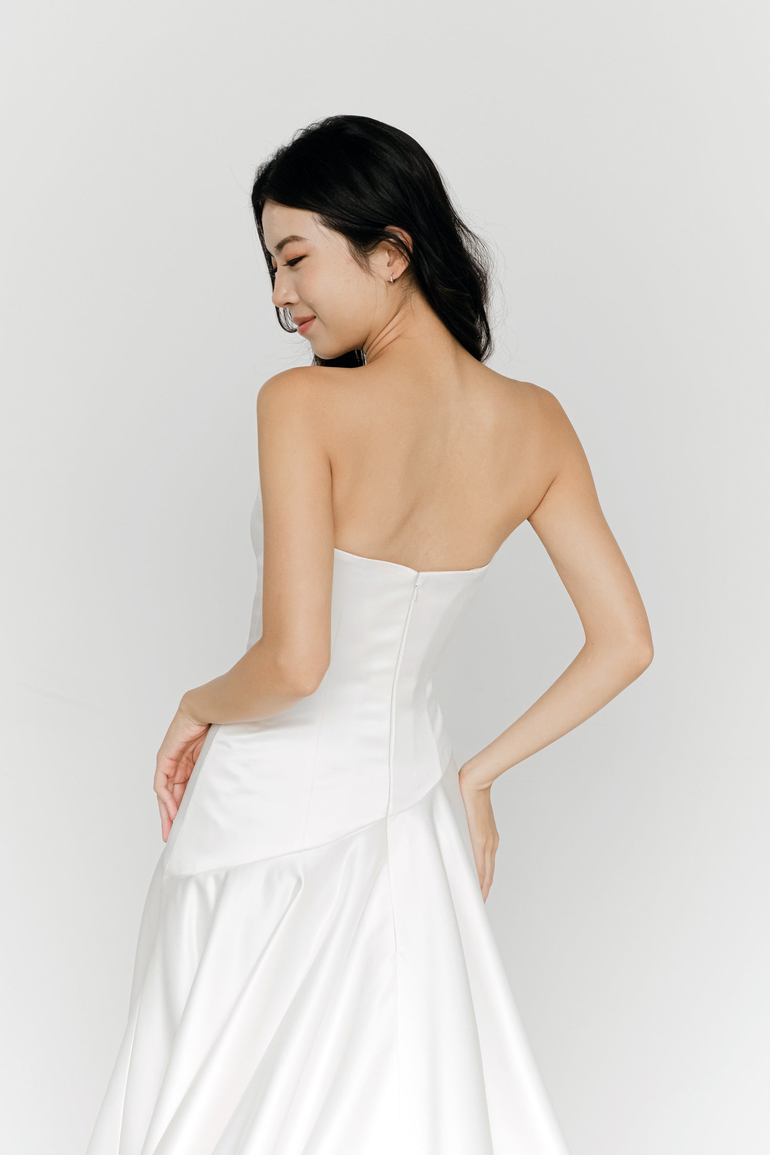 Carmen bridal gown back view with an elegant minimalist design