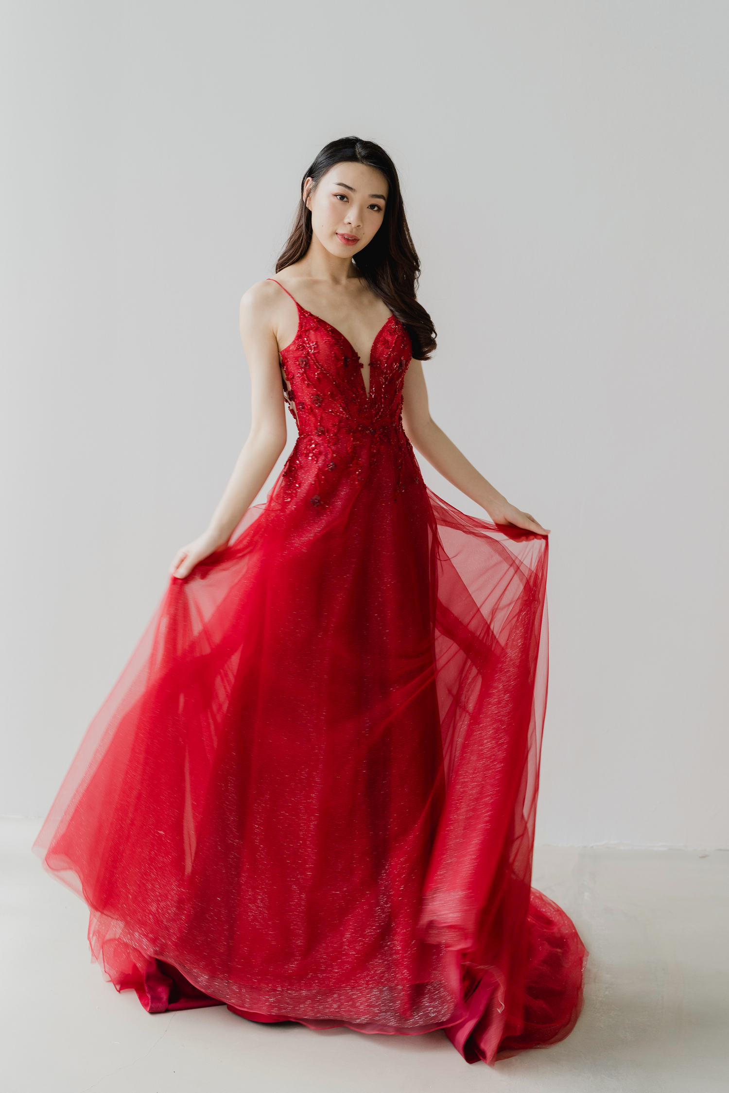 Charlotte evening dress featuring a sparkling A-line silhouette and floral beadwork