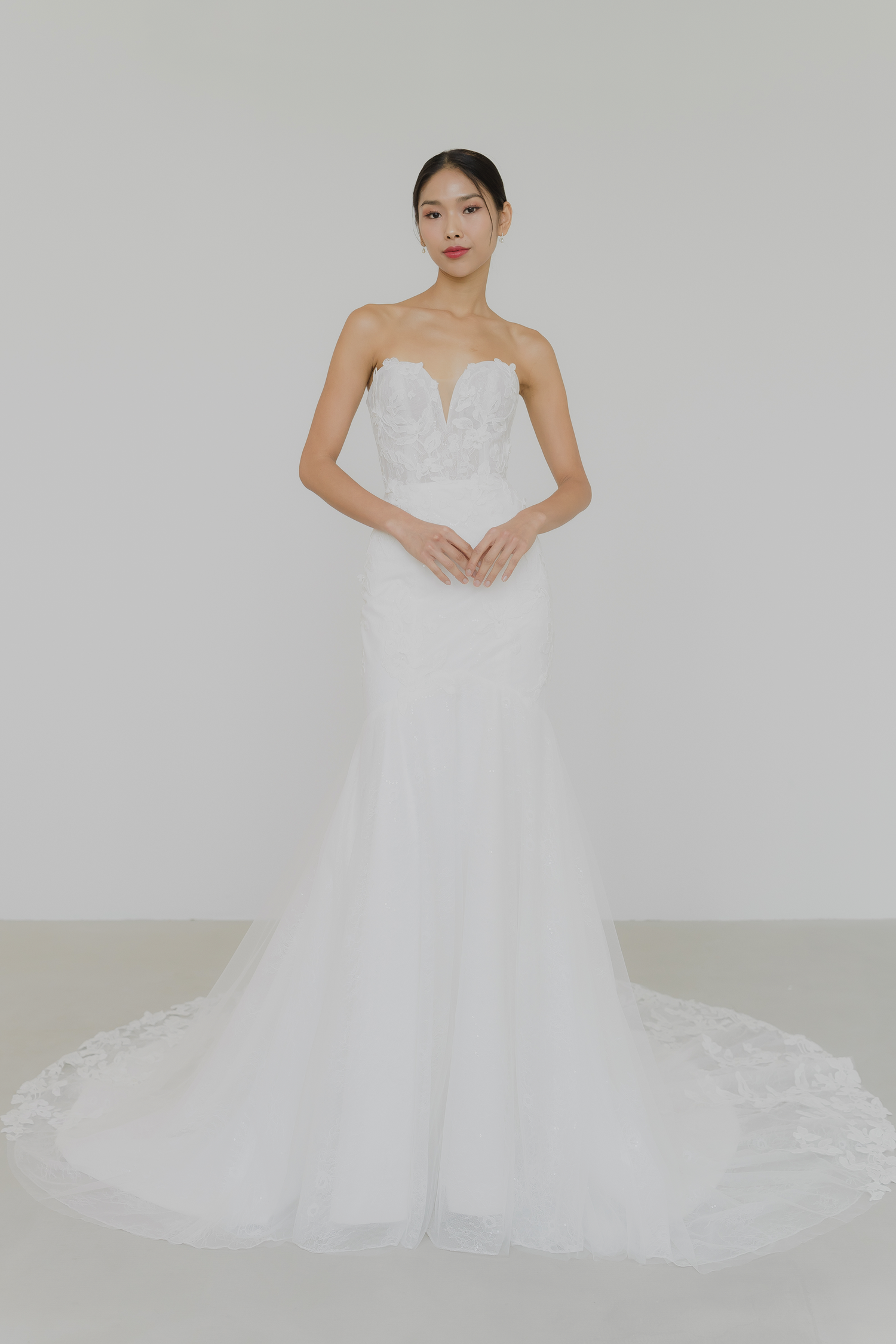 Chevonne bridal gown front view with a sweetheart neckline and fitted lace silhouette