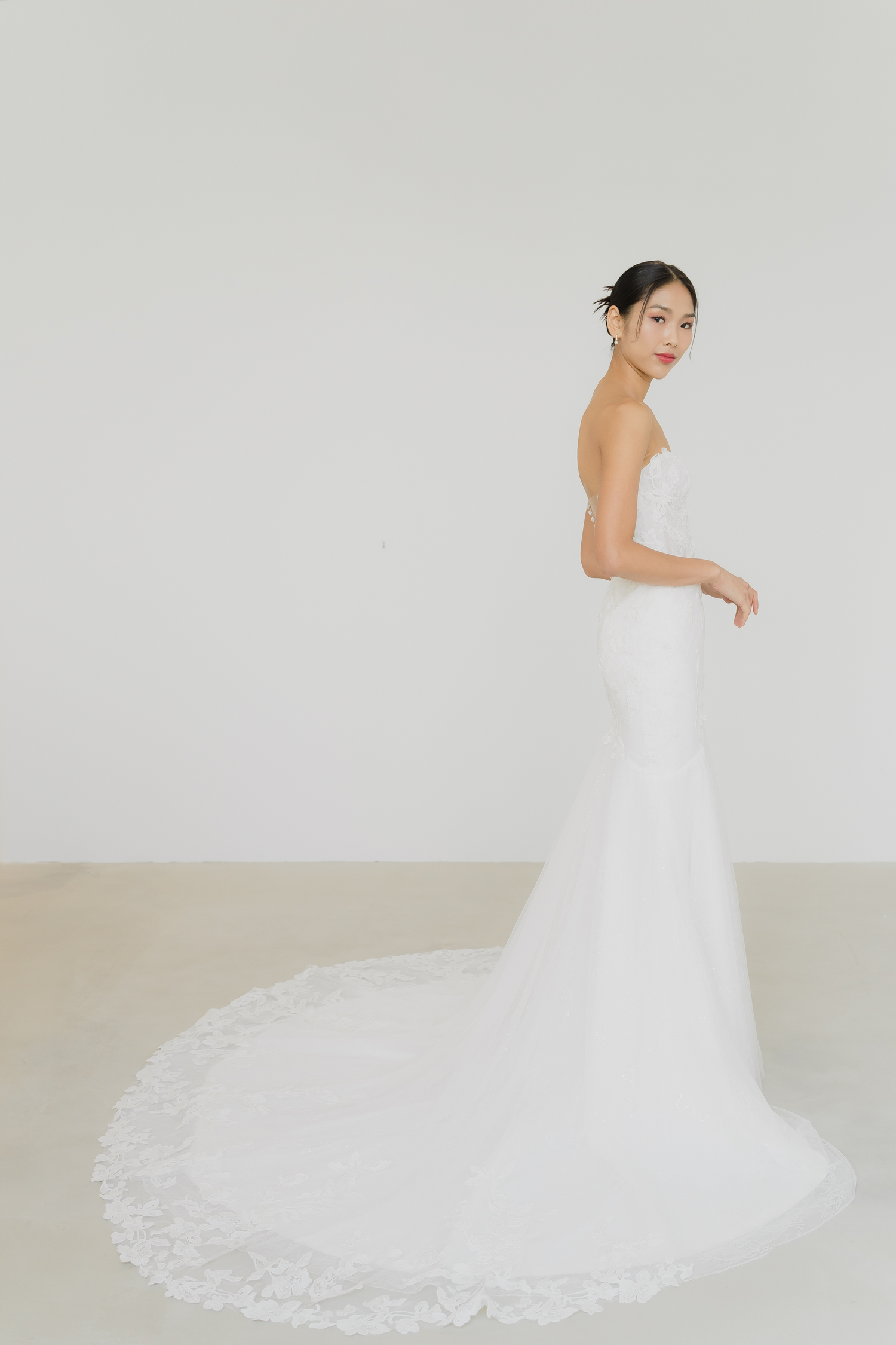 Chevonne bridal gown side view with a softly flared silhouette