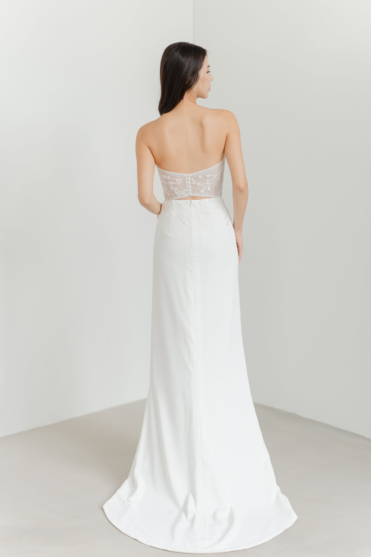 Cleo bridal gown back view with a striking open back cutout