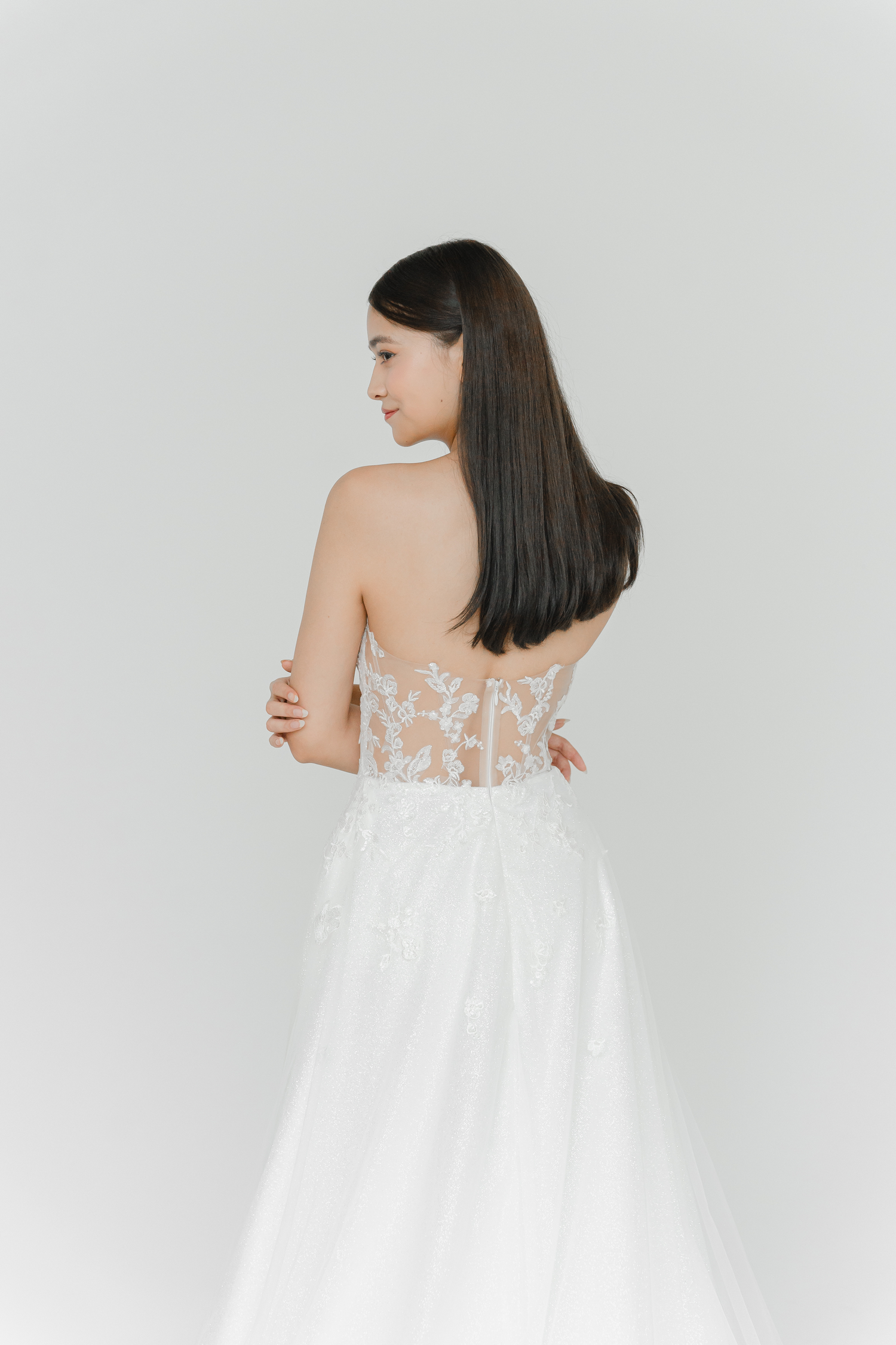 Close-up of Cyra bridal gown showcasing the illusion back detailing