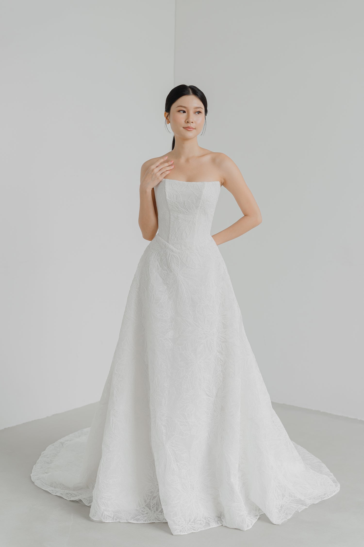 Dakota wedding dress front view with a structured bodice and sculpted V-waist
