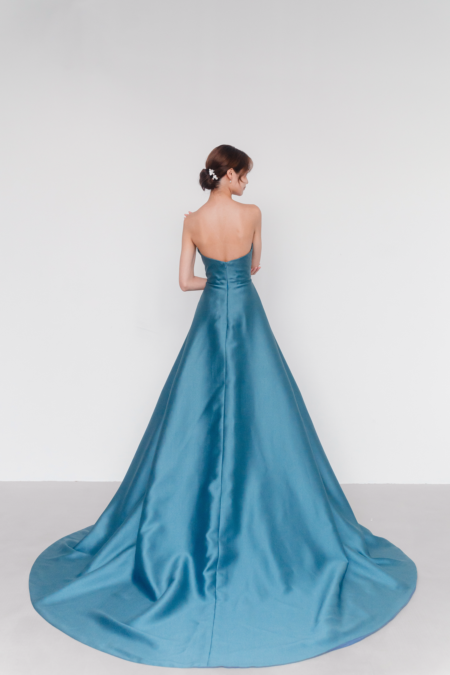 Debra evening dress back view with a clean minimalist silhouette
