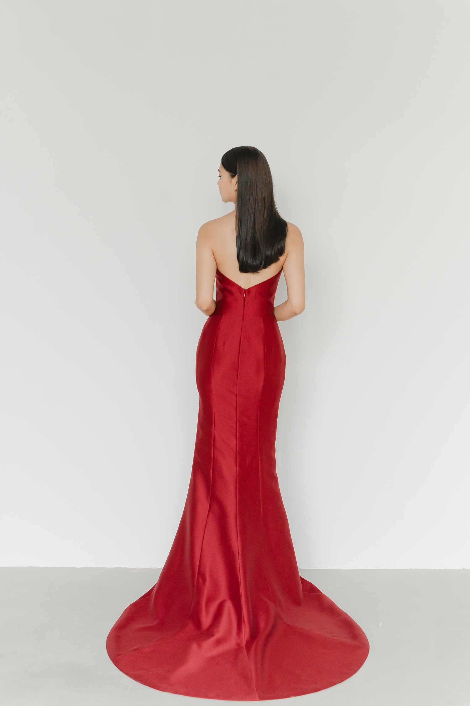 Desiree evening dress back view with a clean minimalist shantung crepe design