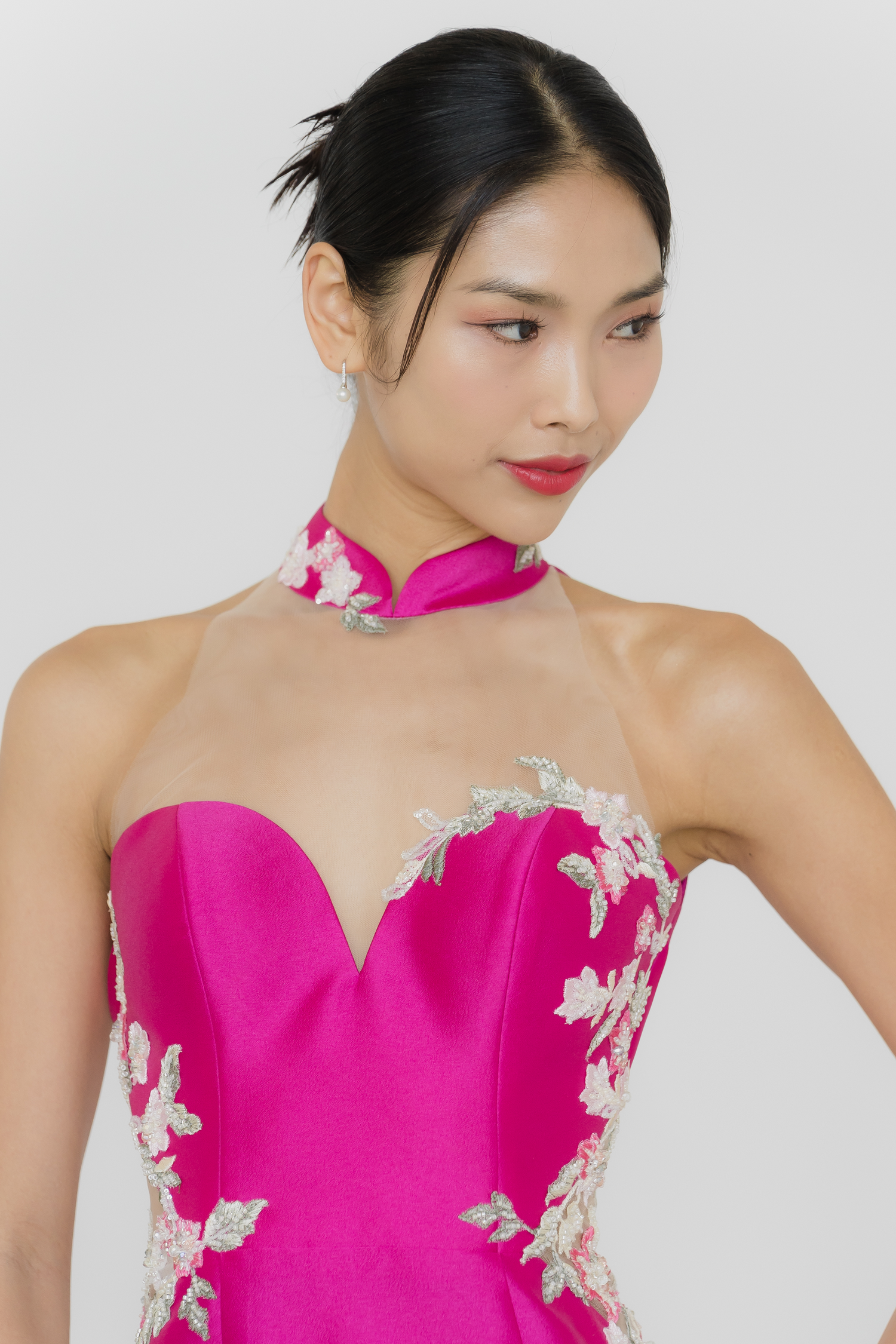 Dionne bridal cheongsam featuring delicate beaded lace appliqués and a modern cheongsam collar