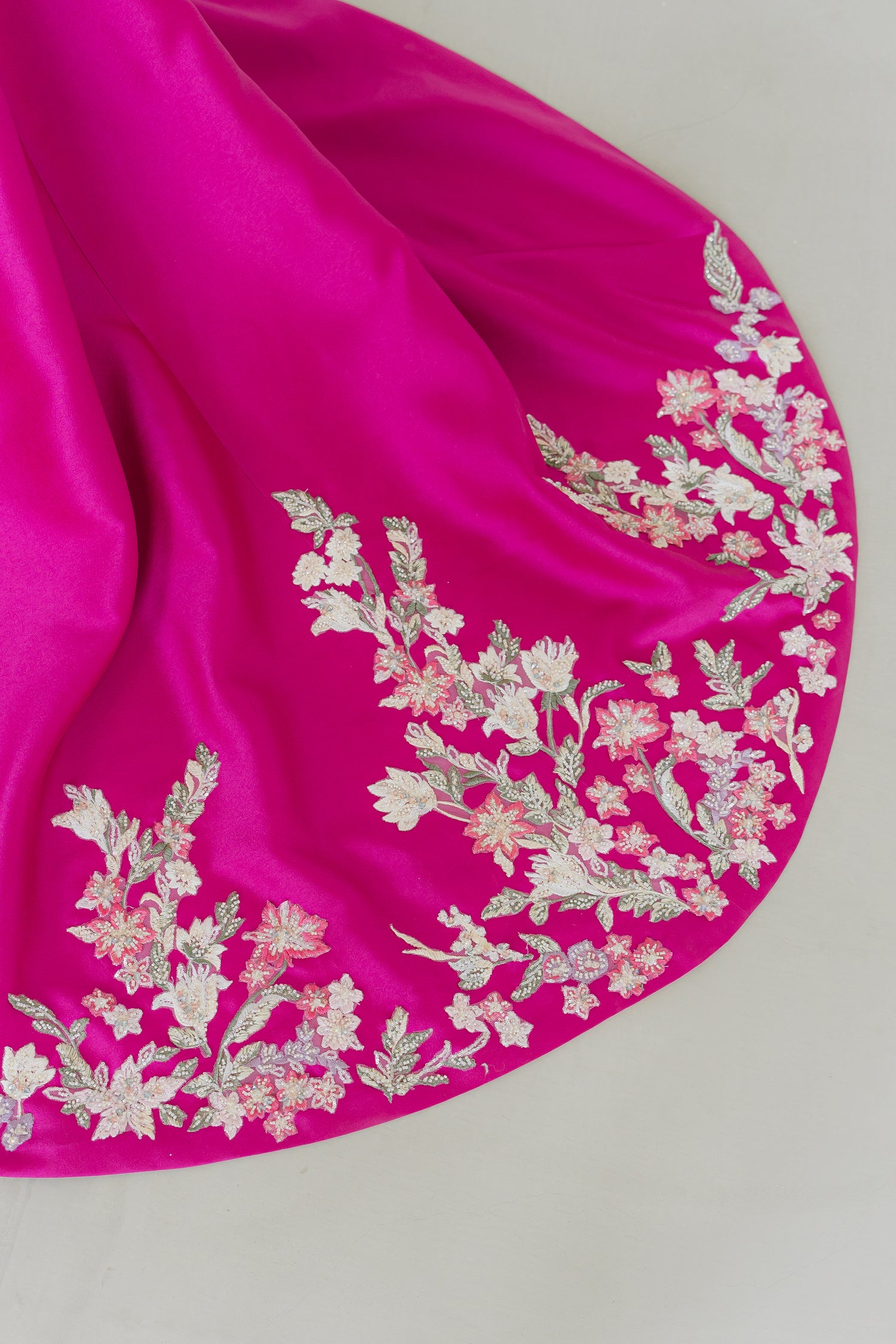 Close-up of Dionne wedding cheongsam highlighting the beaded lace appliqués
