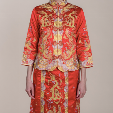 Traditional dragon and phoenix wedding kua for rent by WeddingCrafters in Singapore, featuring auspicious gold embroidery for Chinese weddings and tea ceremonies.