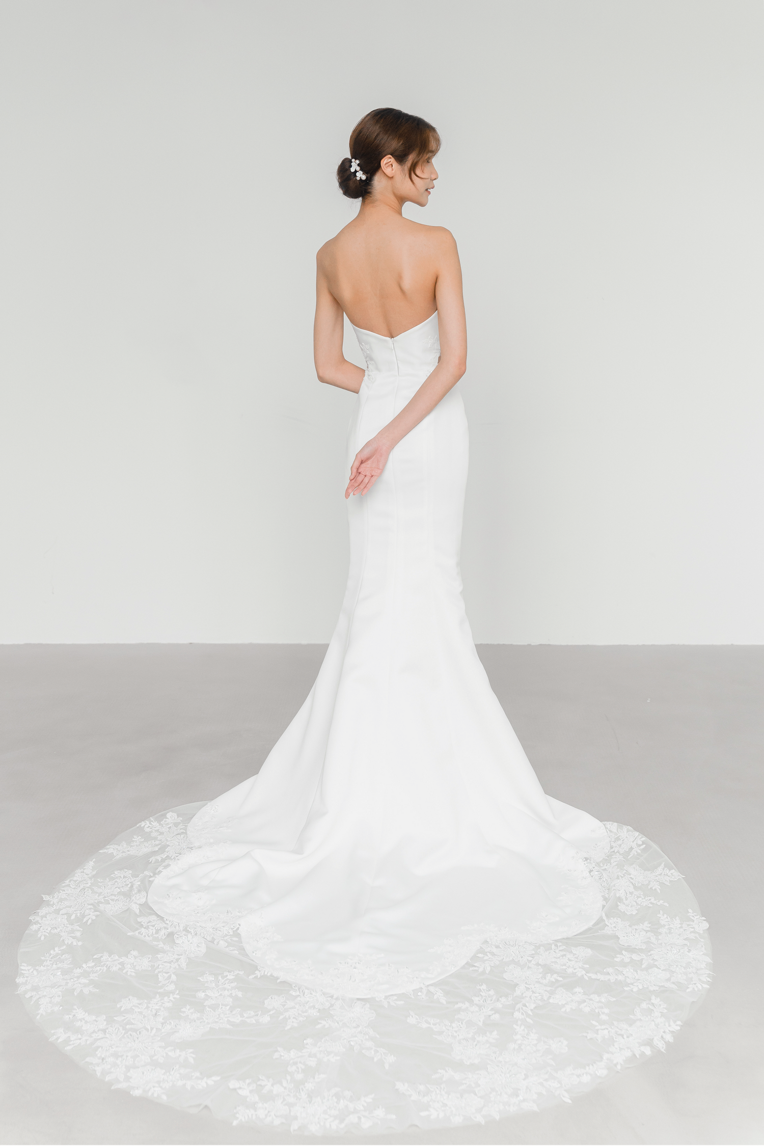 Eleanor bridal gown back view with a lace-edged train