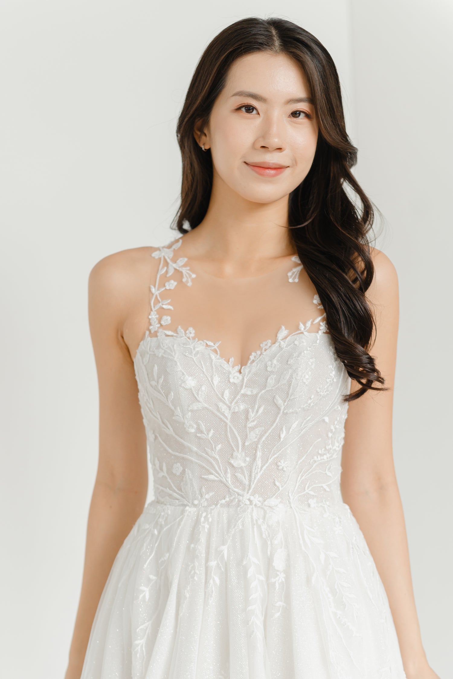 Close-up of Elisha bridal gown showcasing the illusion neckline