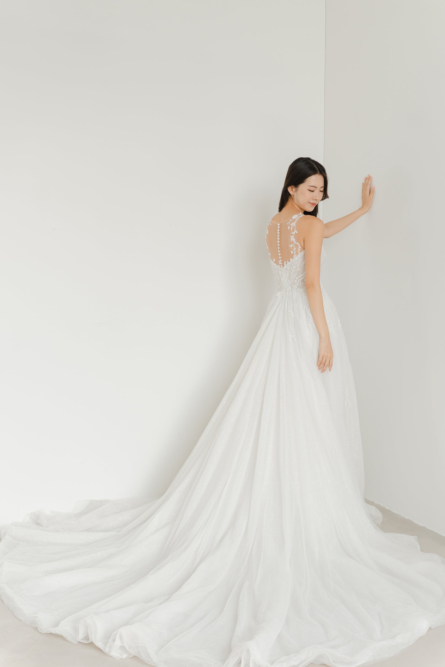 Elisha bridal gown side view showcasing the flowing ballgown silhouette
