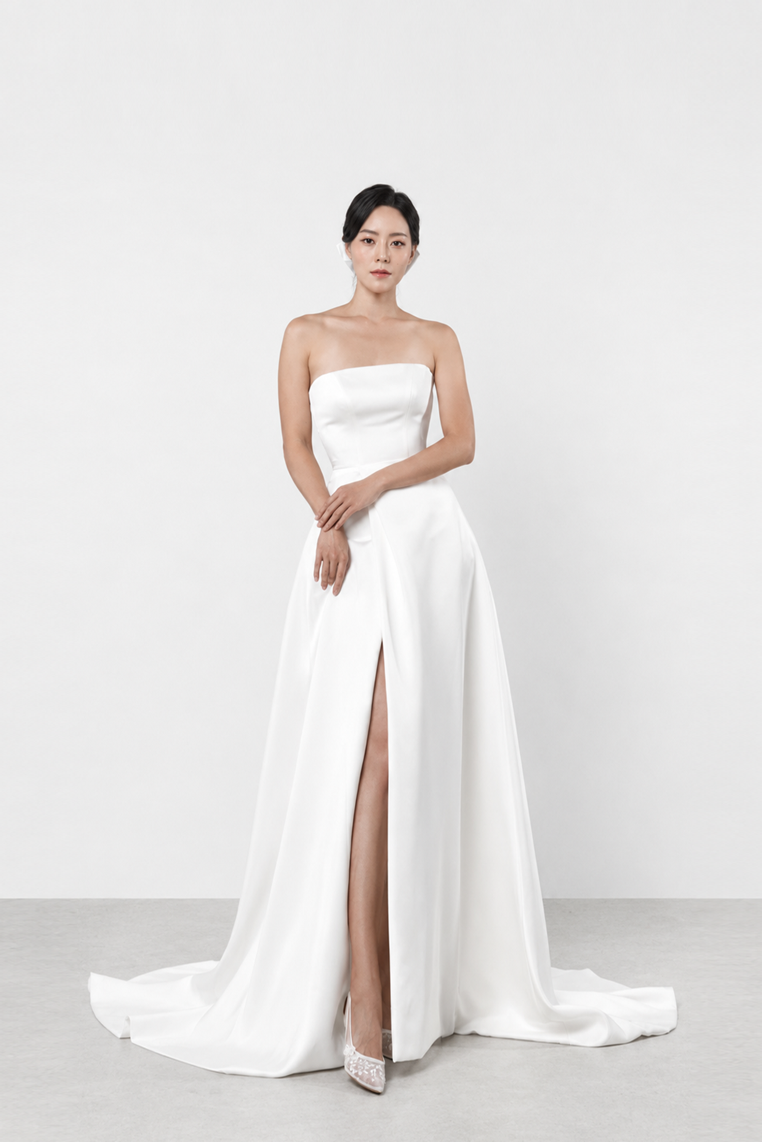 Elodia wedding dress front view with a straight neckline and wrap-front skirt