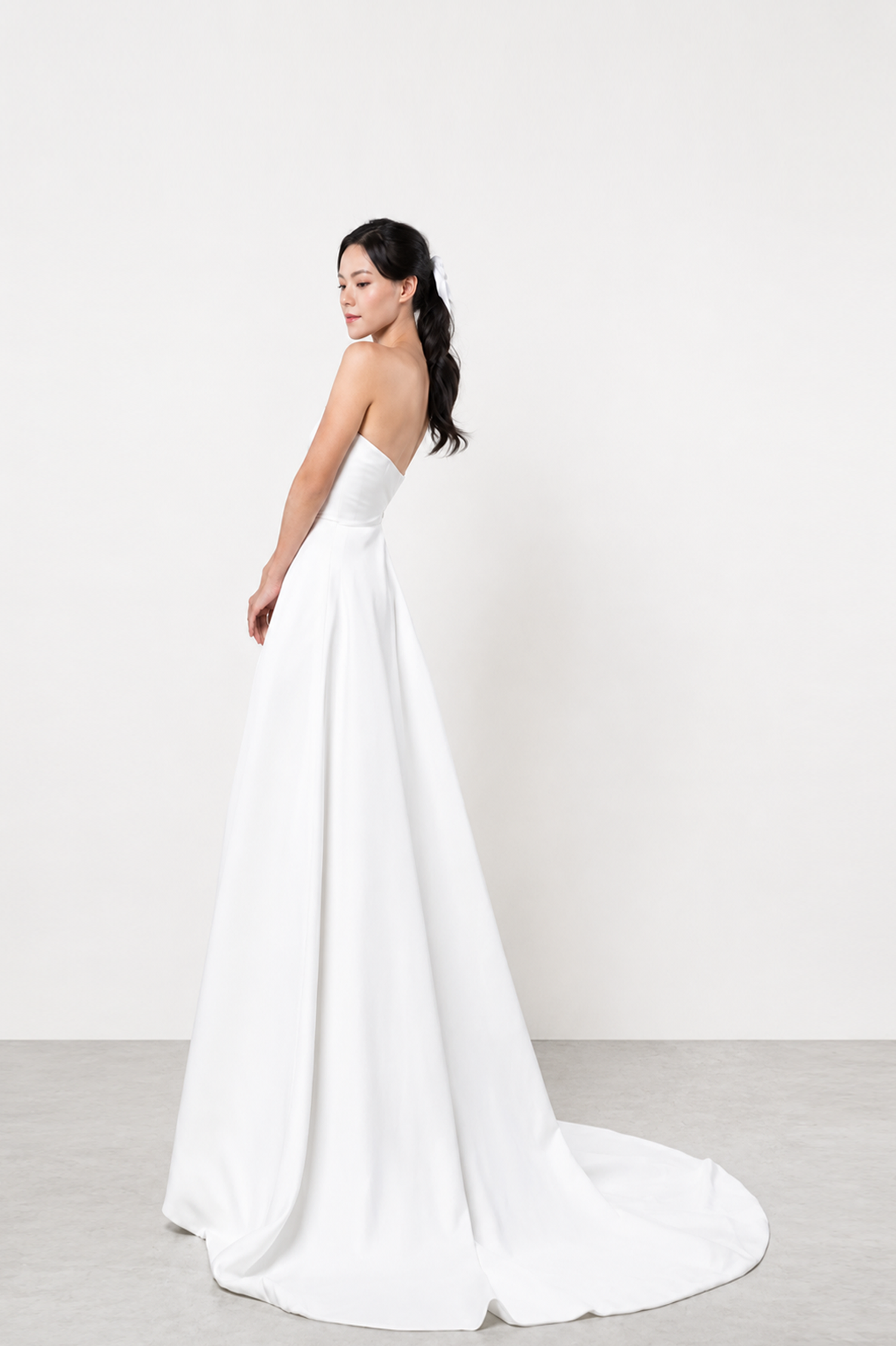 Elodia wedding gown train showcasing the graceful double satin silhouette