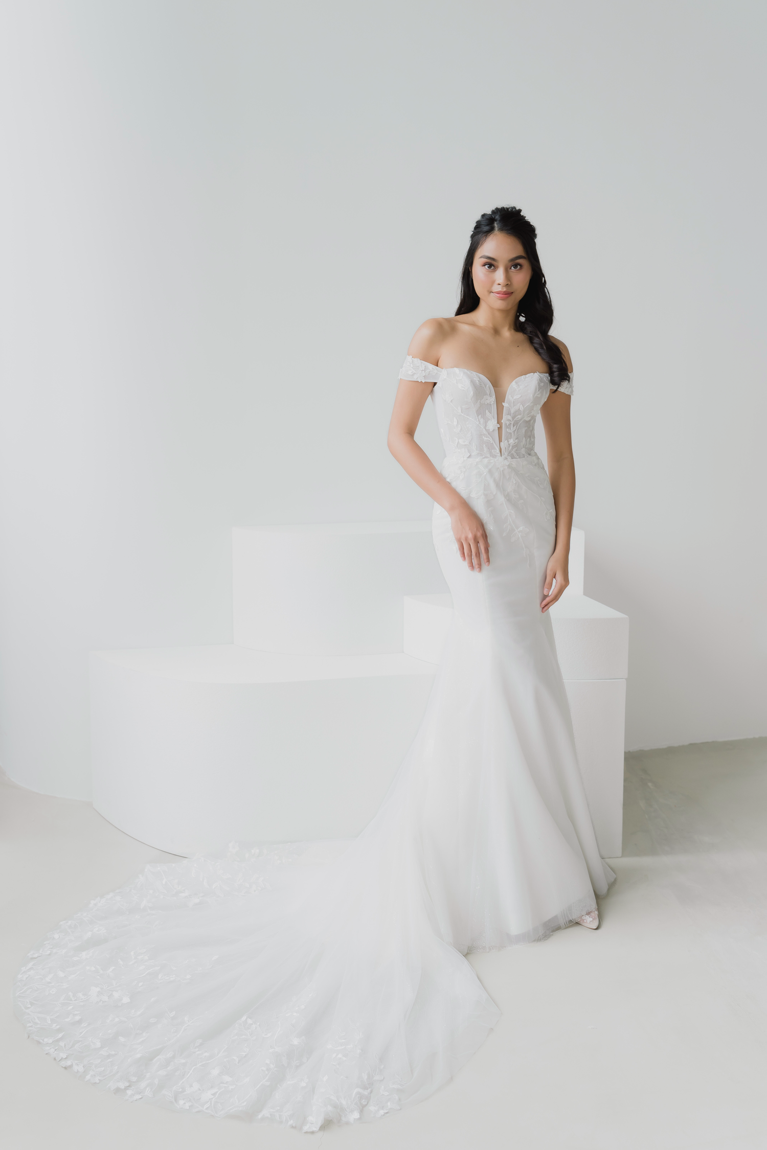 Elyse wedding dress front view with soft off-shoulder sleeves