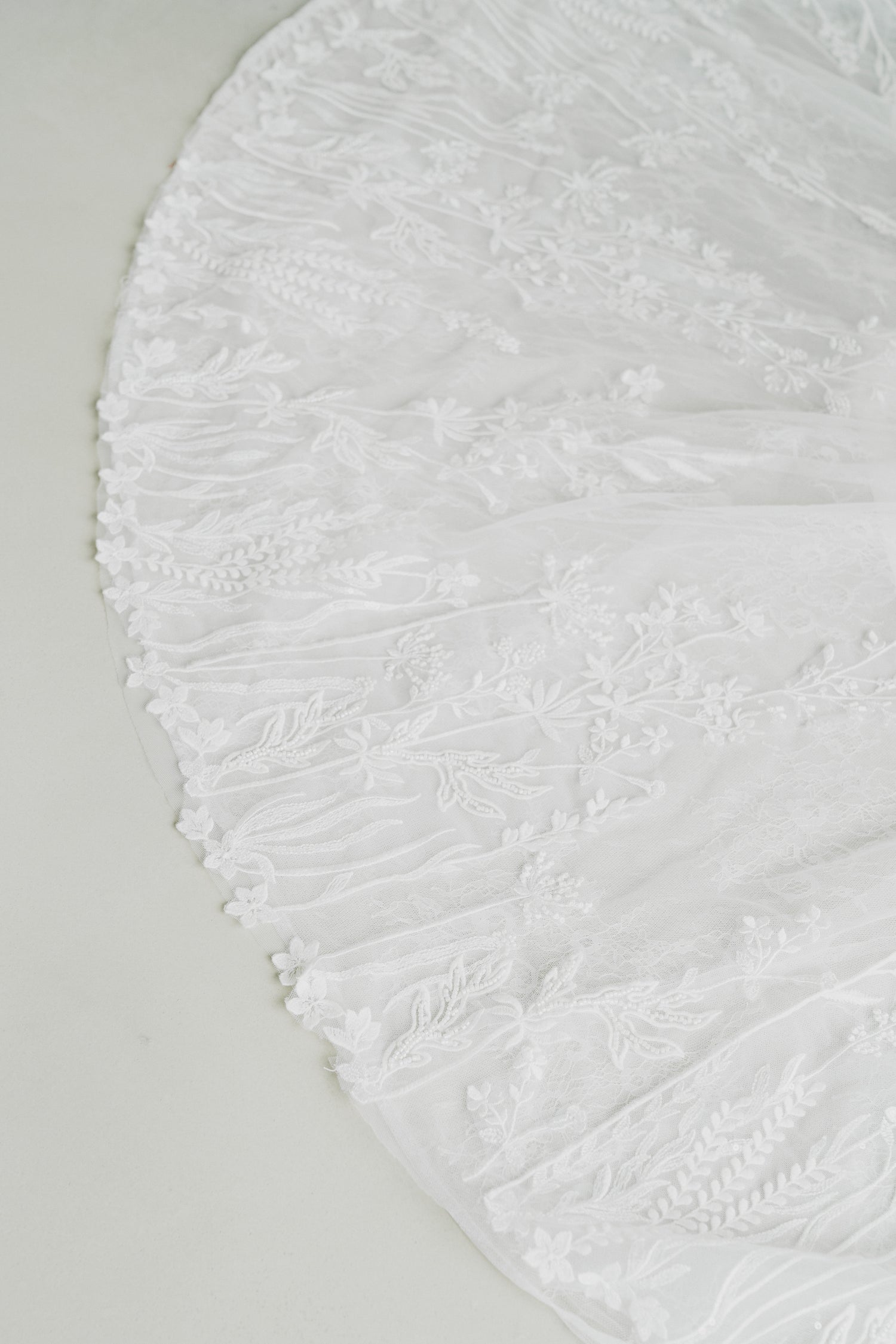 Erica bridal gown featuring a flowing tulle train
