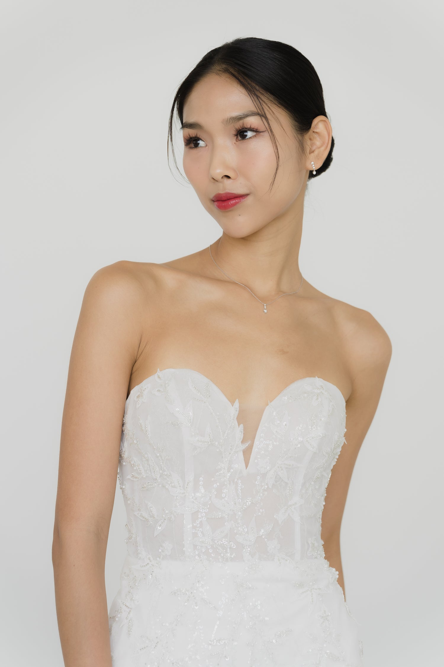 Esme wedding dress front view with a sweetheart neckline and sparkling silhouette
