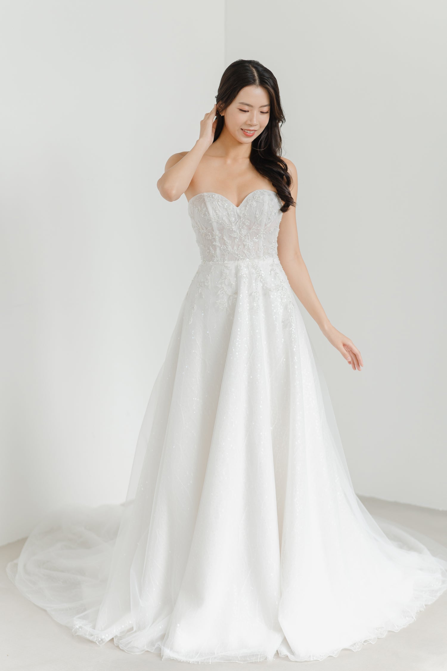 Estee wedding dress front view with a sweetheart neckline and classic A-line silhouette