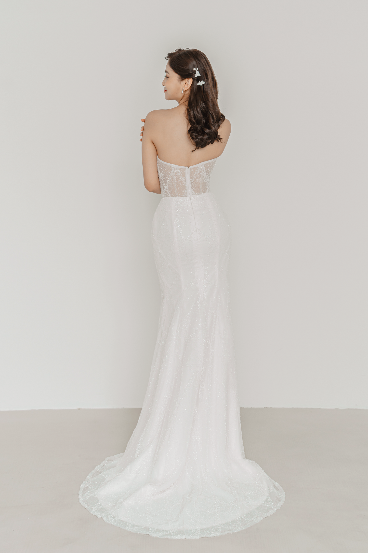 Etta bridal gown back view with a fitted silhouette