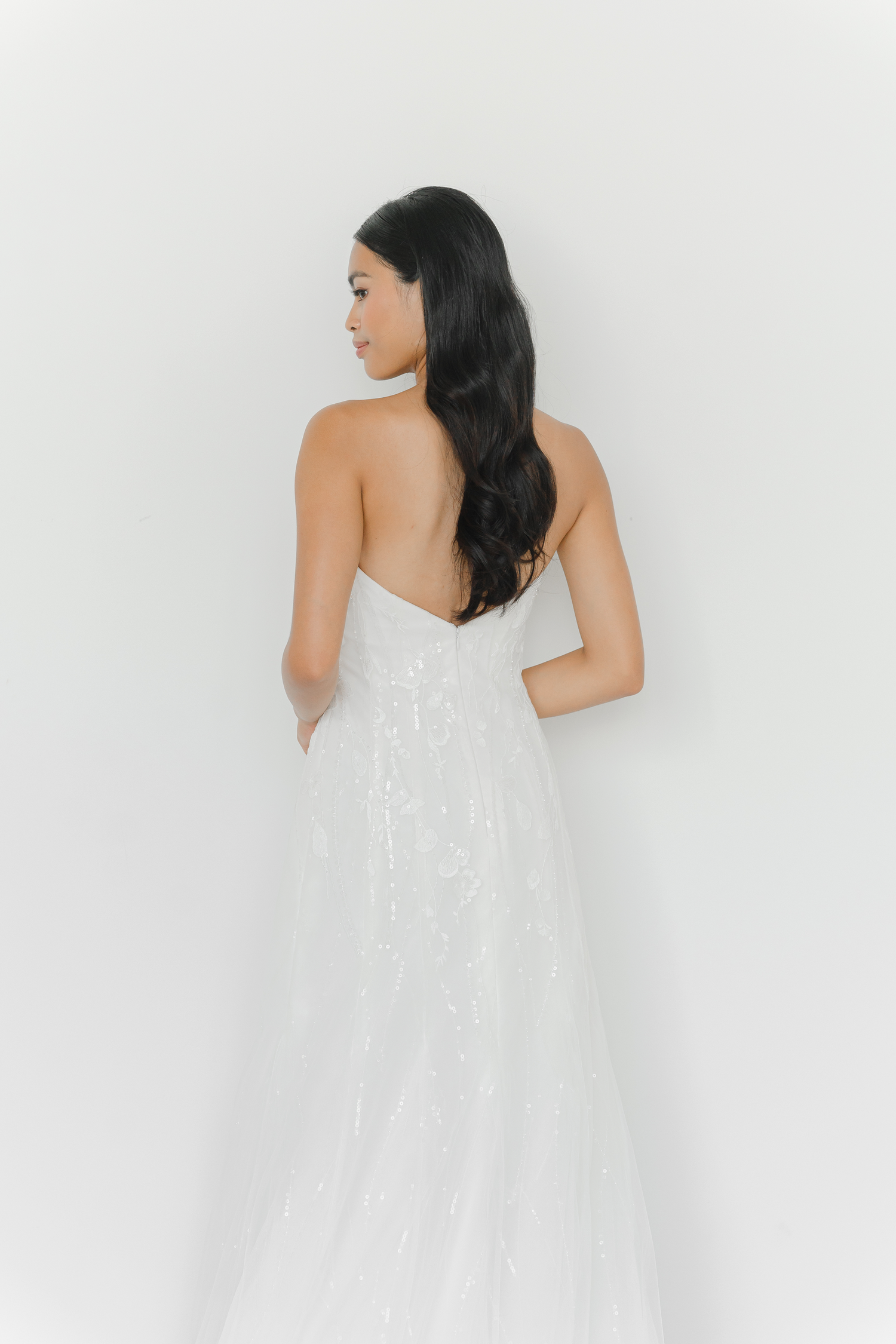Evan bridal gown back view with a clean elegant design