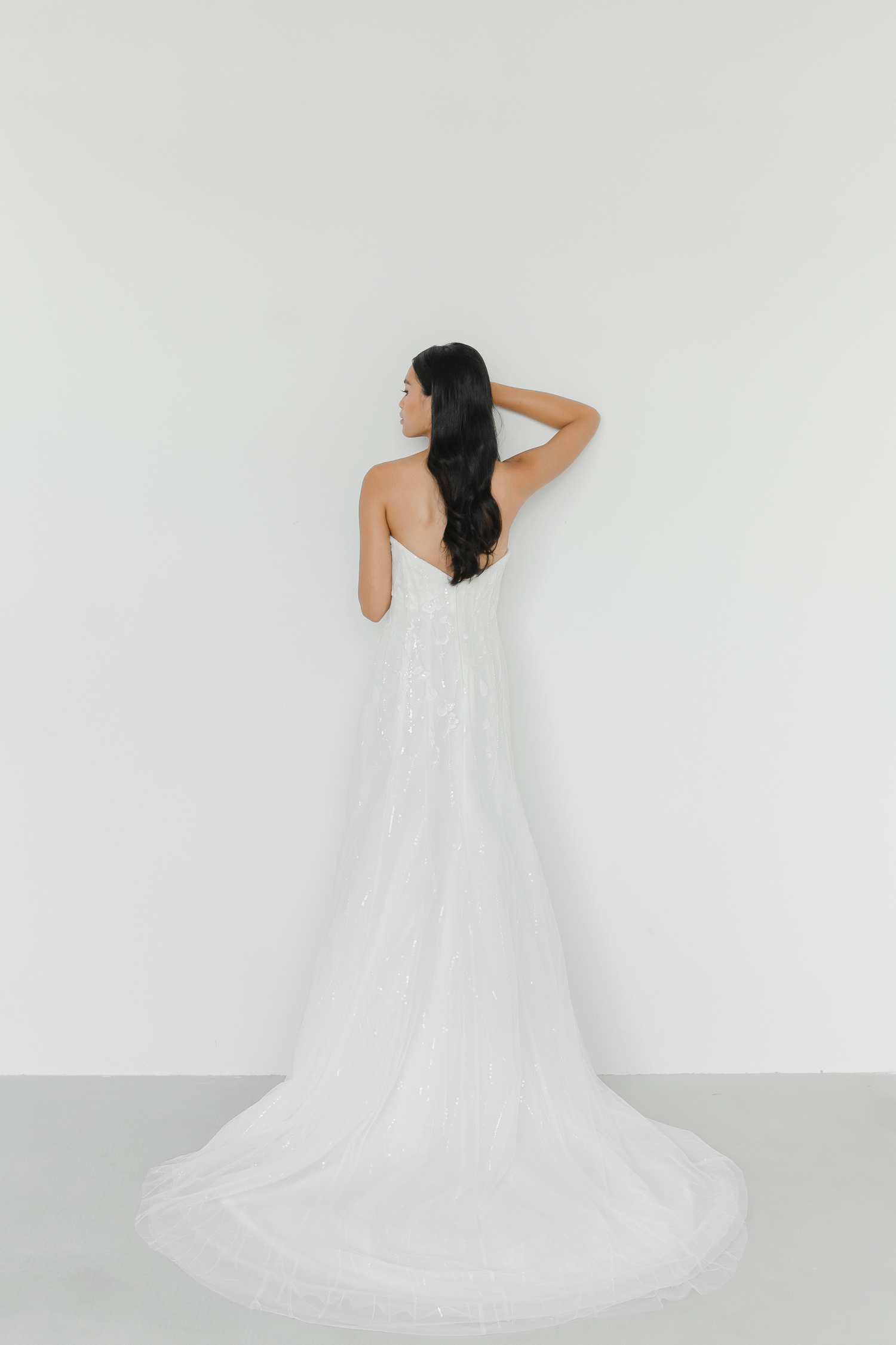 Evan wedding gown train showcasing subtle sparkle and a graceful flowing train