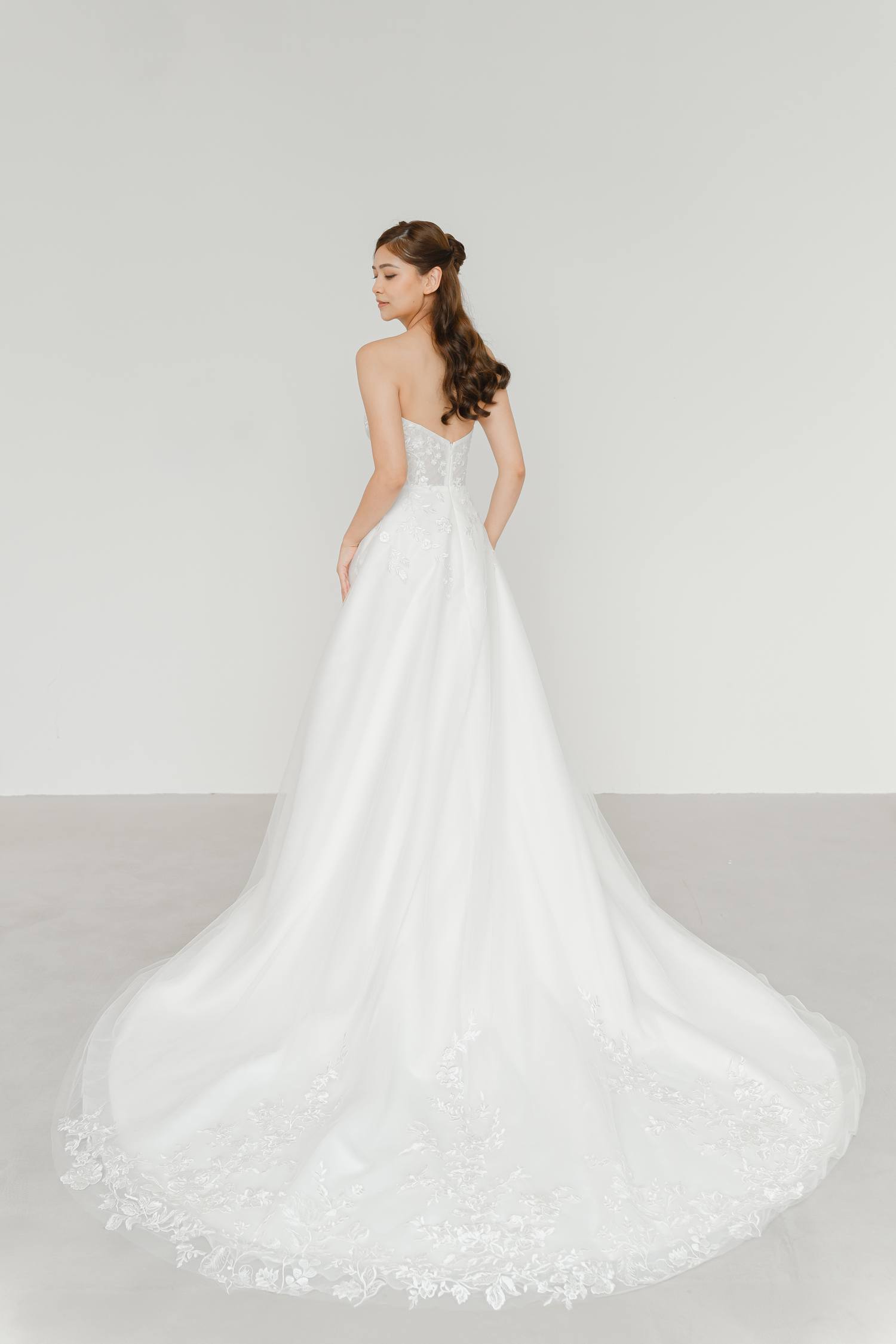 Freya bridal gown side view with a romantic A-line silhouette
