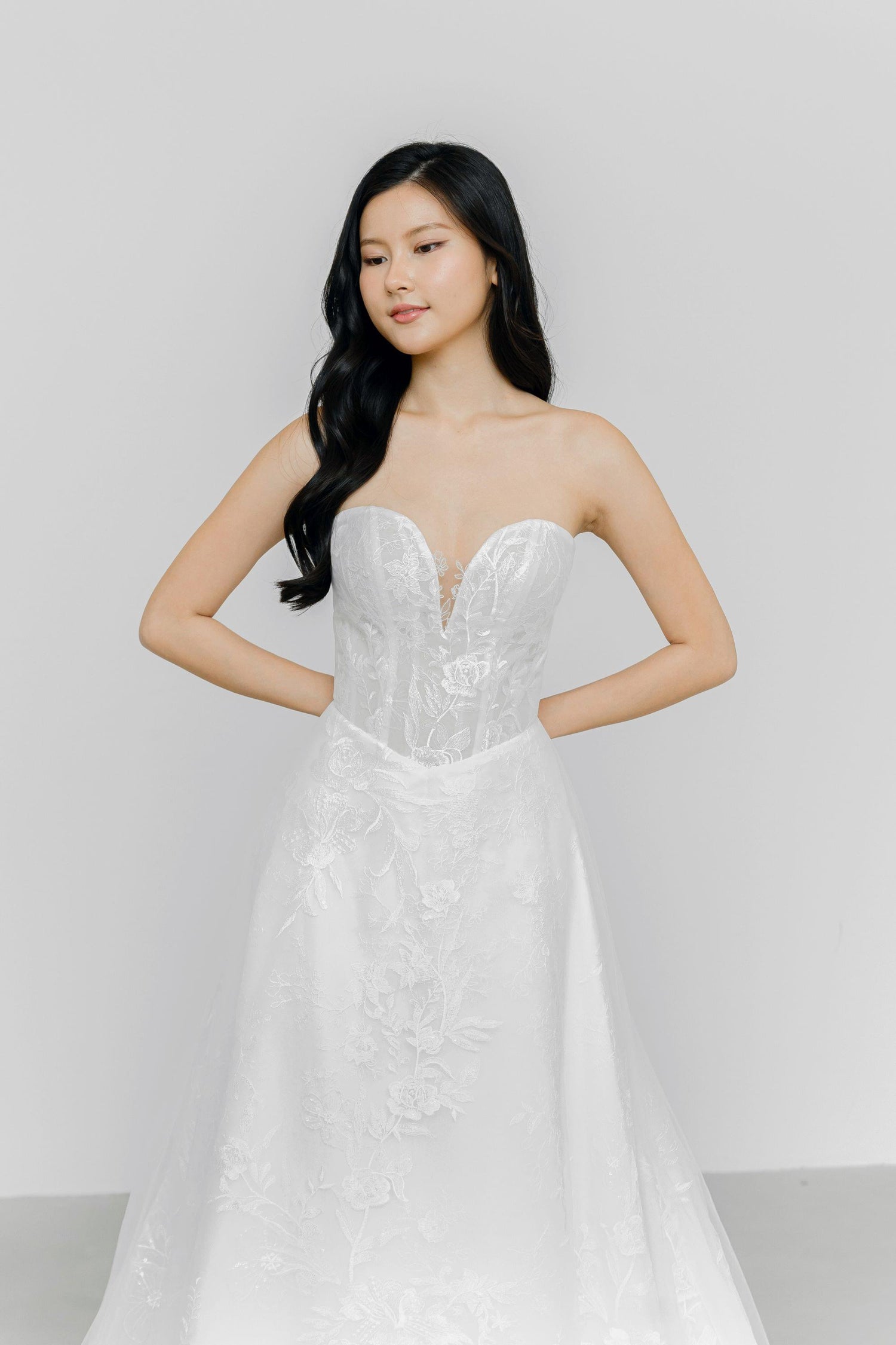 Close-up of Gabriella wedding dress highlighting the intricate full lace detailing