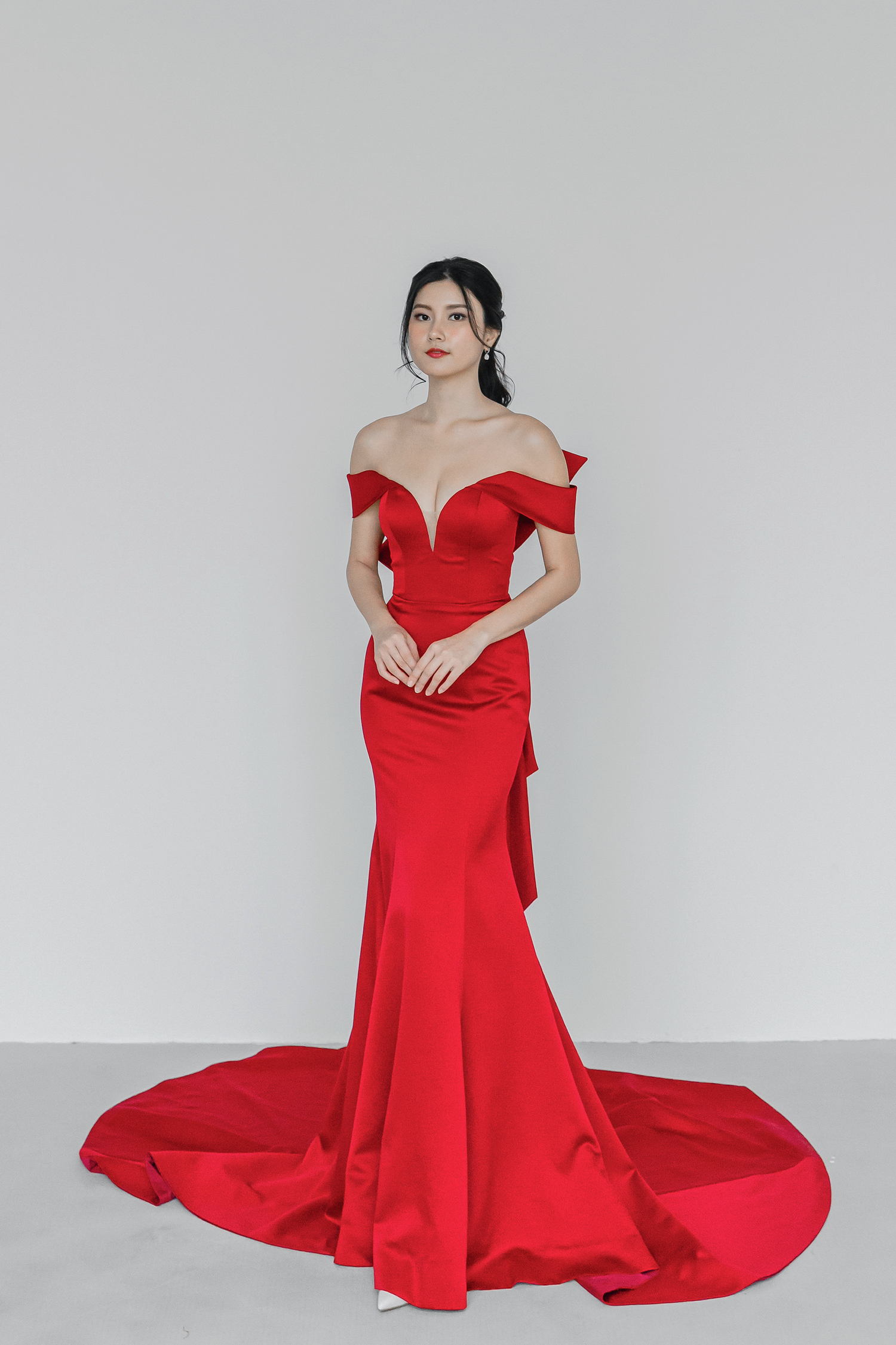 Gizelle evening dress featuring a sleek red satin mermaid silhouette