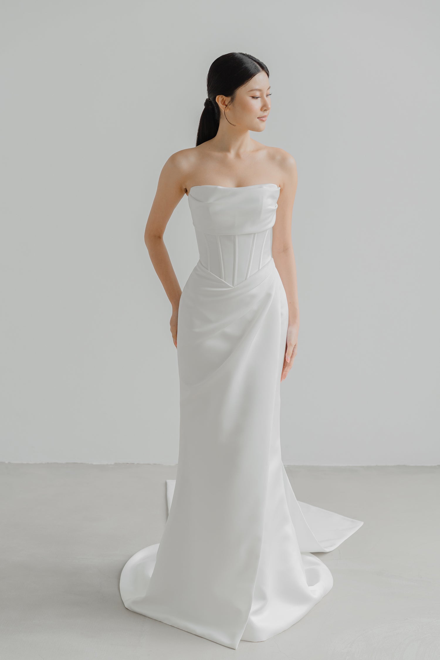 Gracelyn wedding dress front view with a soft cowl neckline and minimalist silhouette