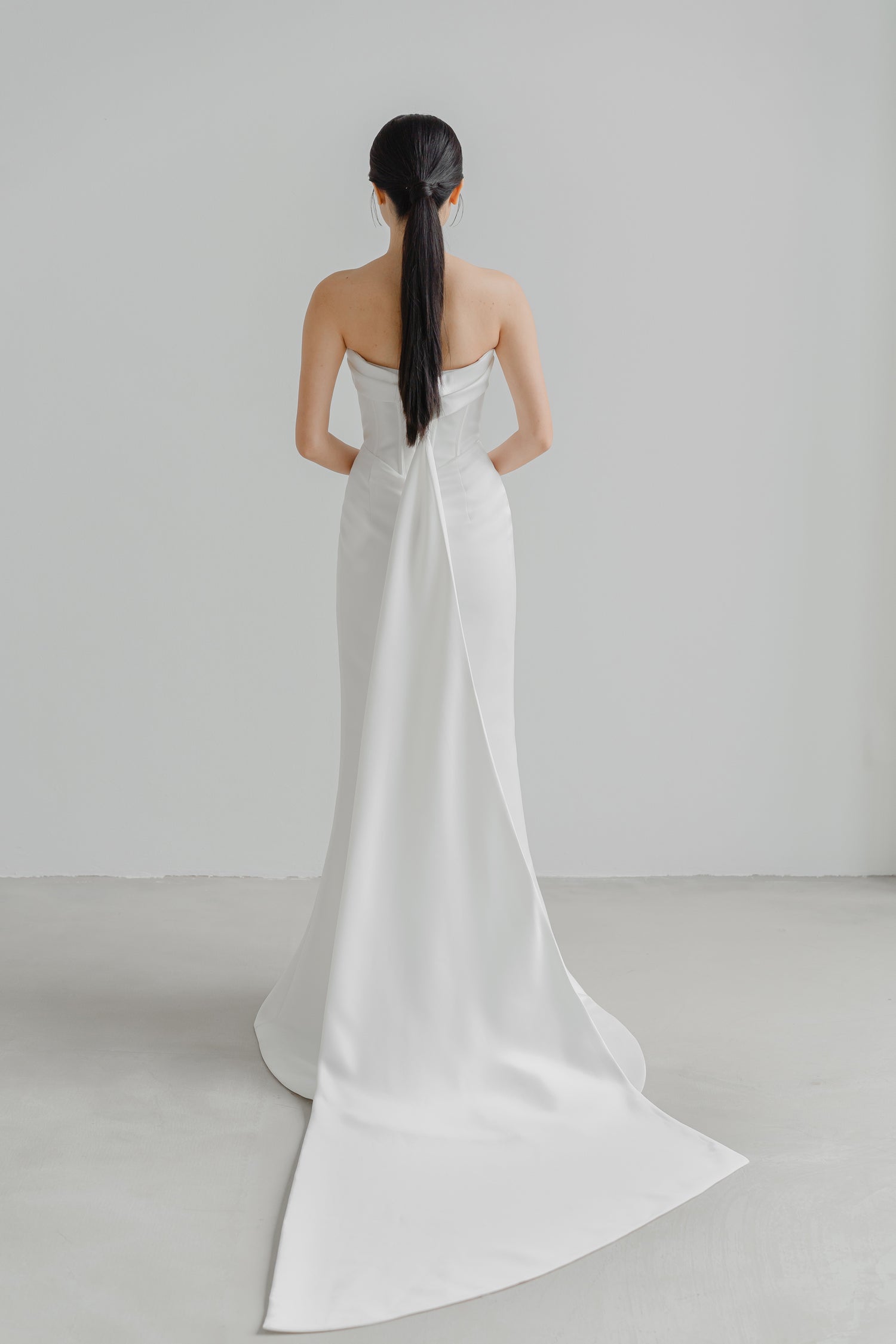 Gracelyn wedding gown train showcasing the elegant minimalist silhouette and flowing train