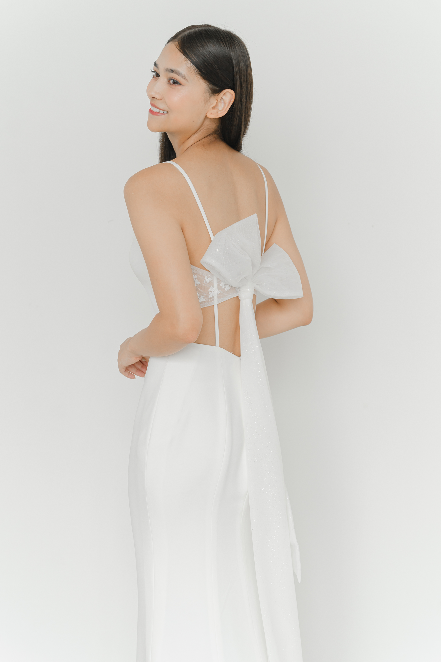 Gwen bridal gown side view with a flattering fitted silhouette