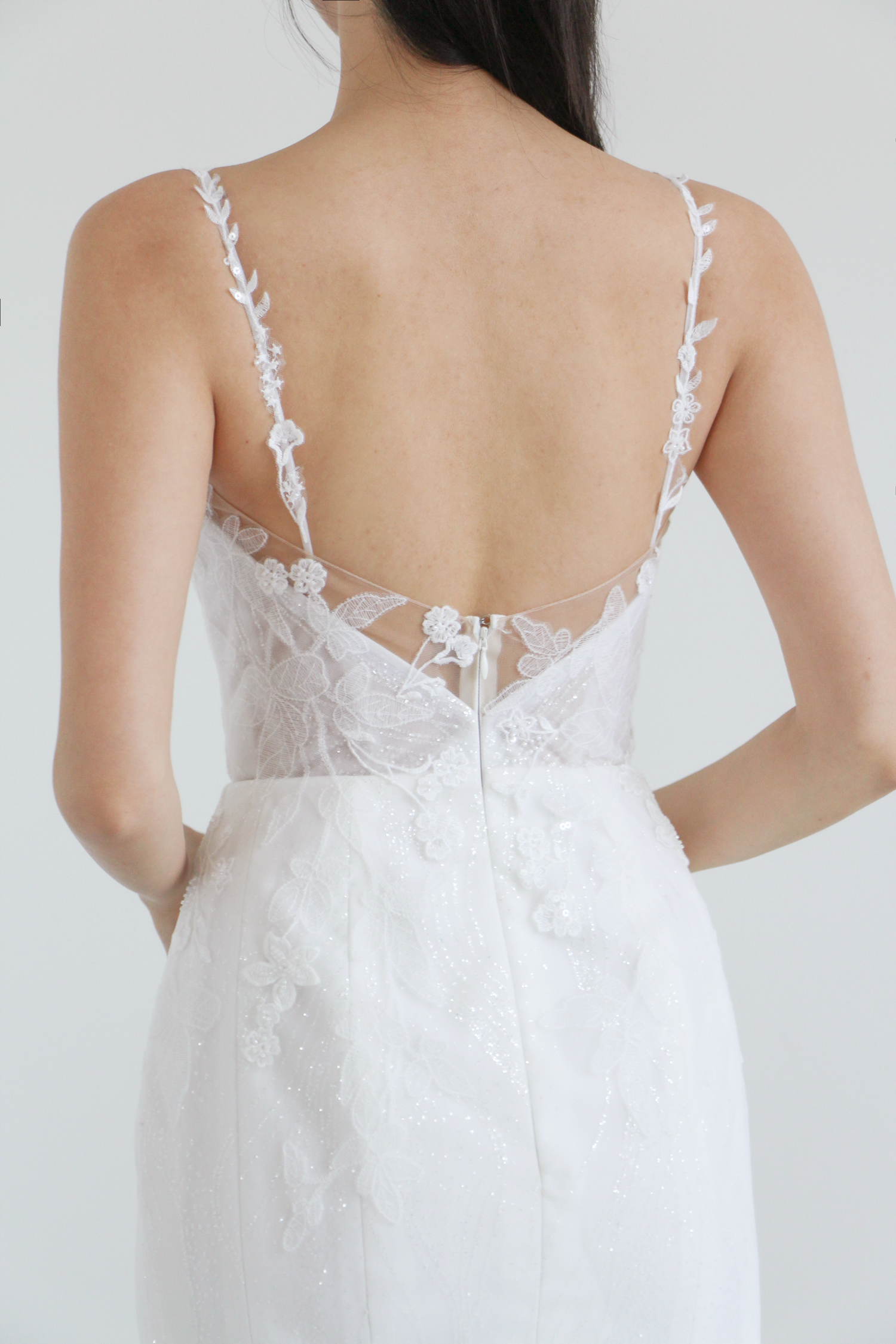 Close-up of Hallie wedding dress with delicate lace detailing