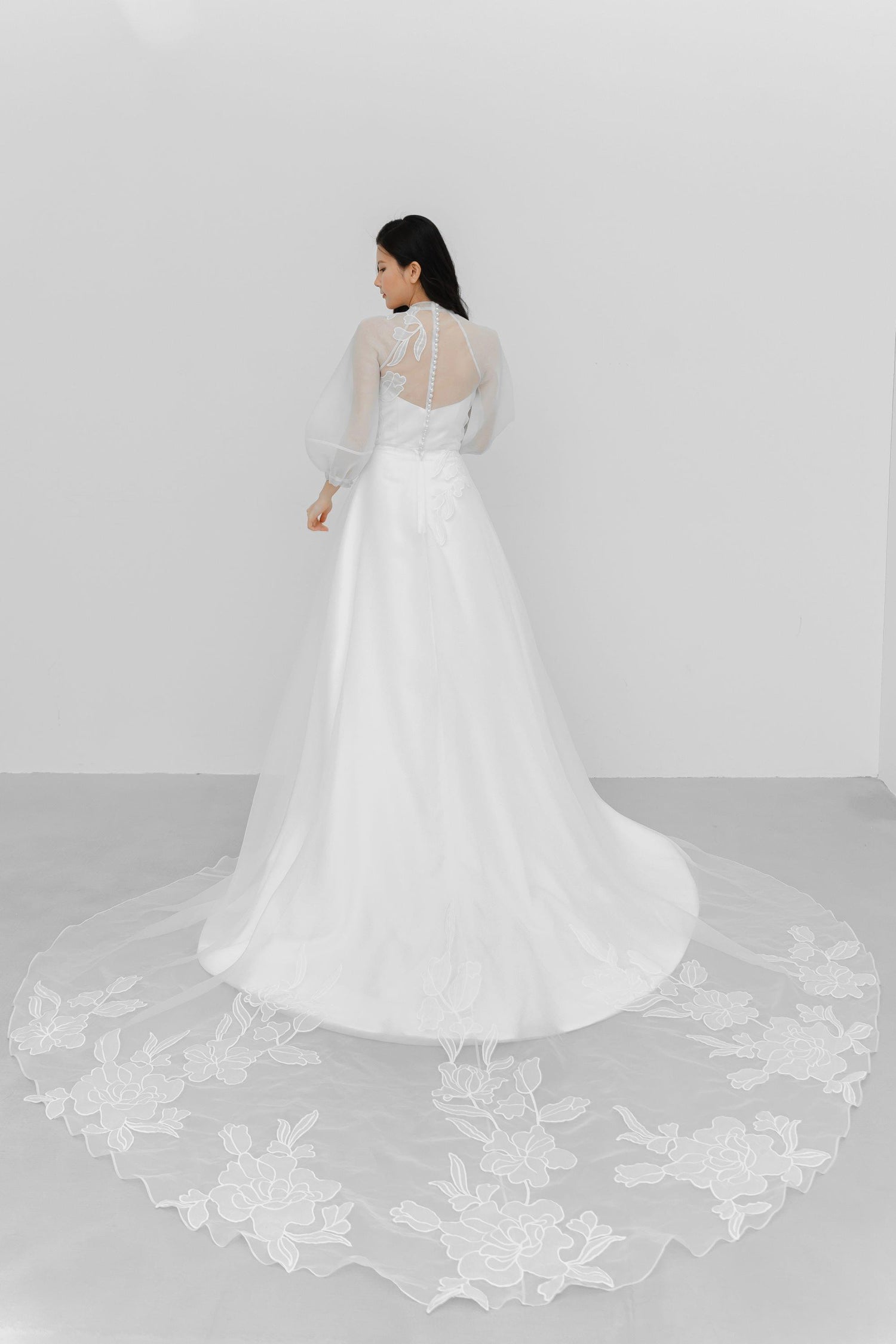 Ivanna wedding dress back view with the detachable organza overlay