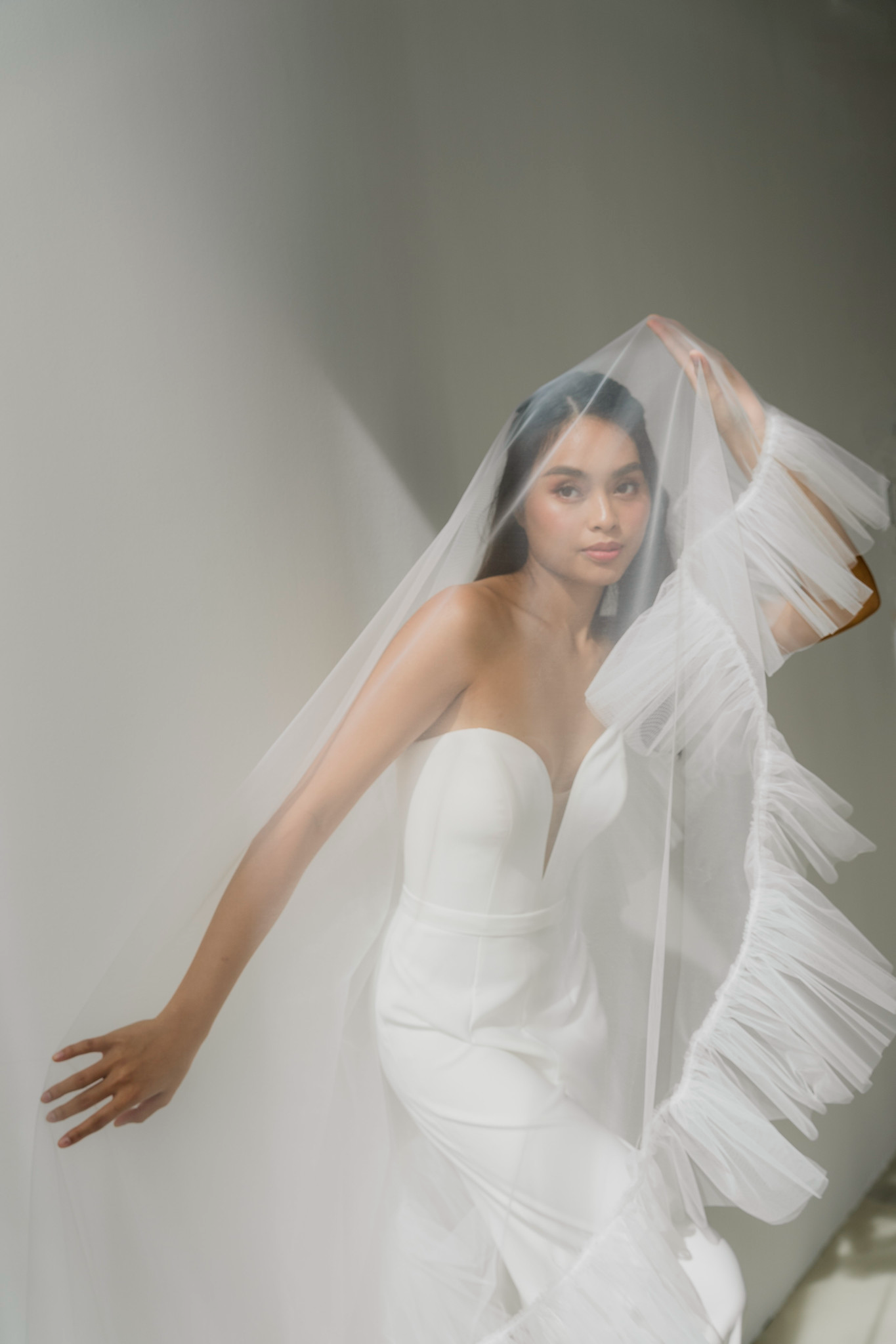 Janice bridal jumpsuit featuring a structured bodice and wide-leg silhouette