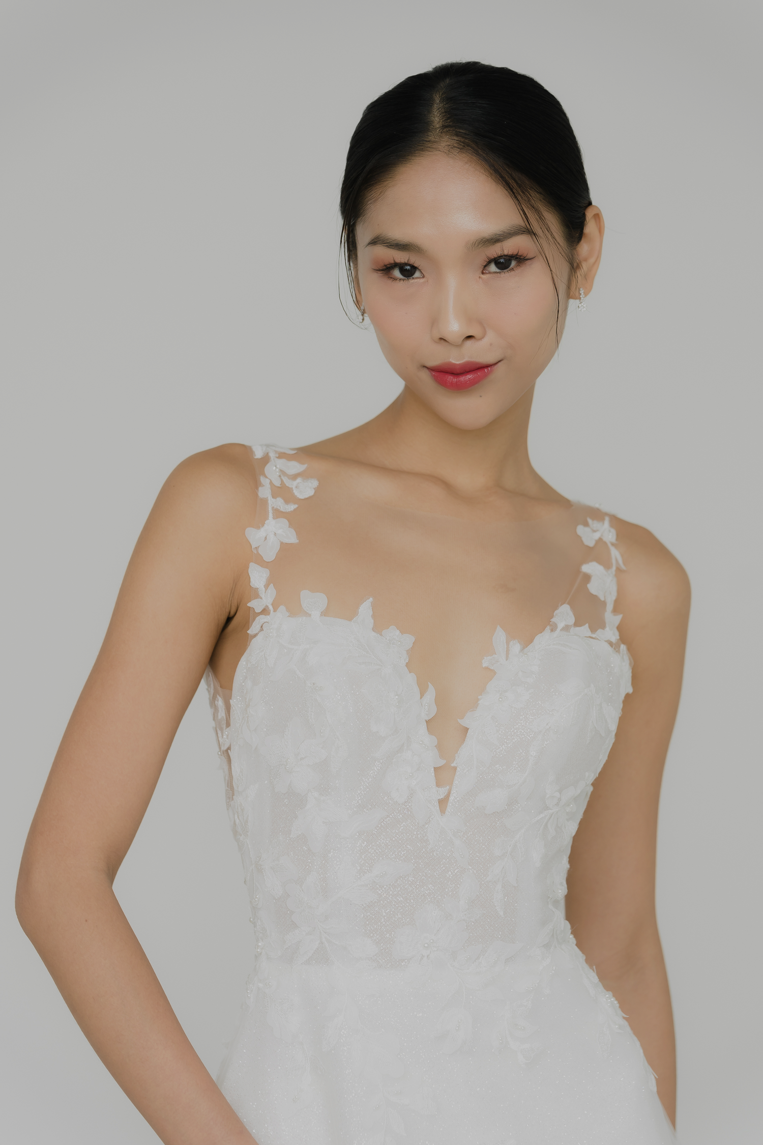 Close-up of Jenica bridal gown showcasing the illusion neckline