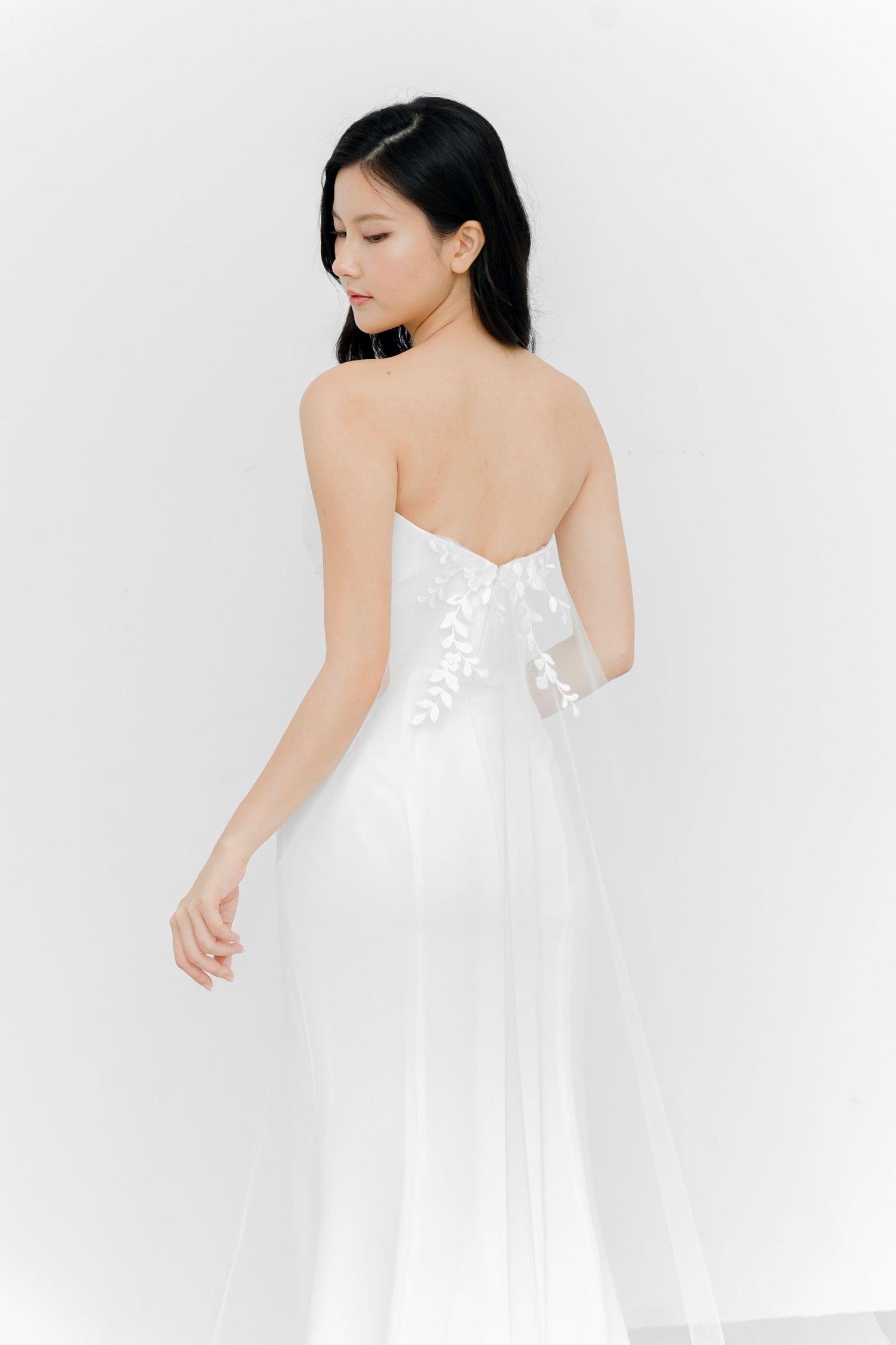 Jenna bridal gown back view with a clean contemporary design