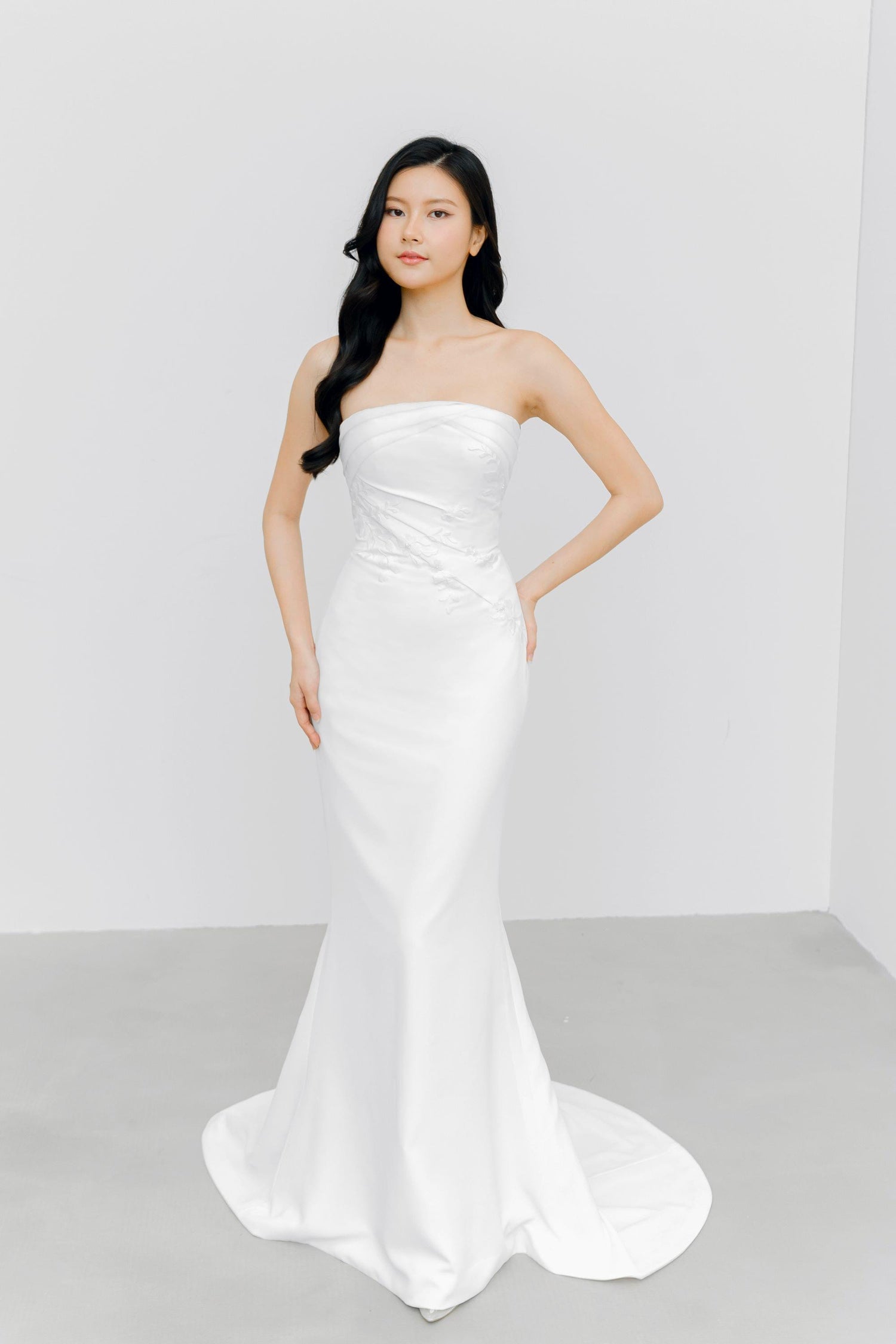 Jenna wedding dress front view with a modest neckline and softly ruched bodice