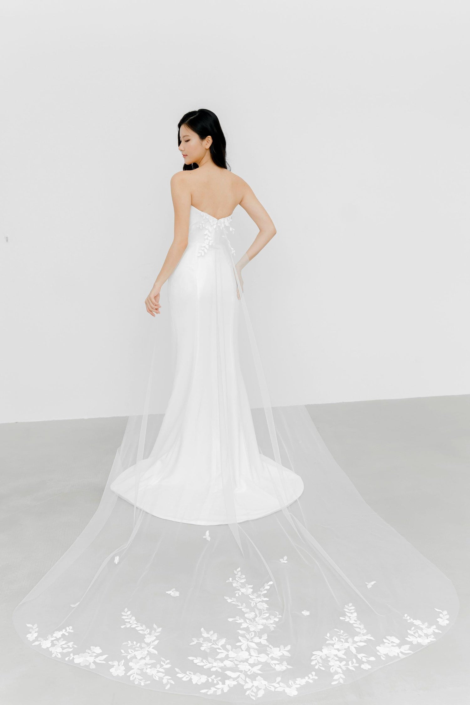 Jenna wedding gown with the detachable lace tulle train creating a dramatic bridal look