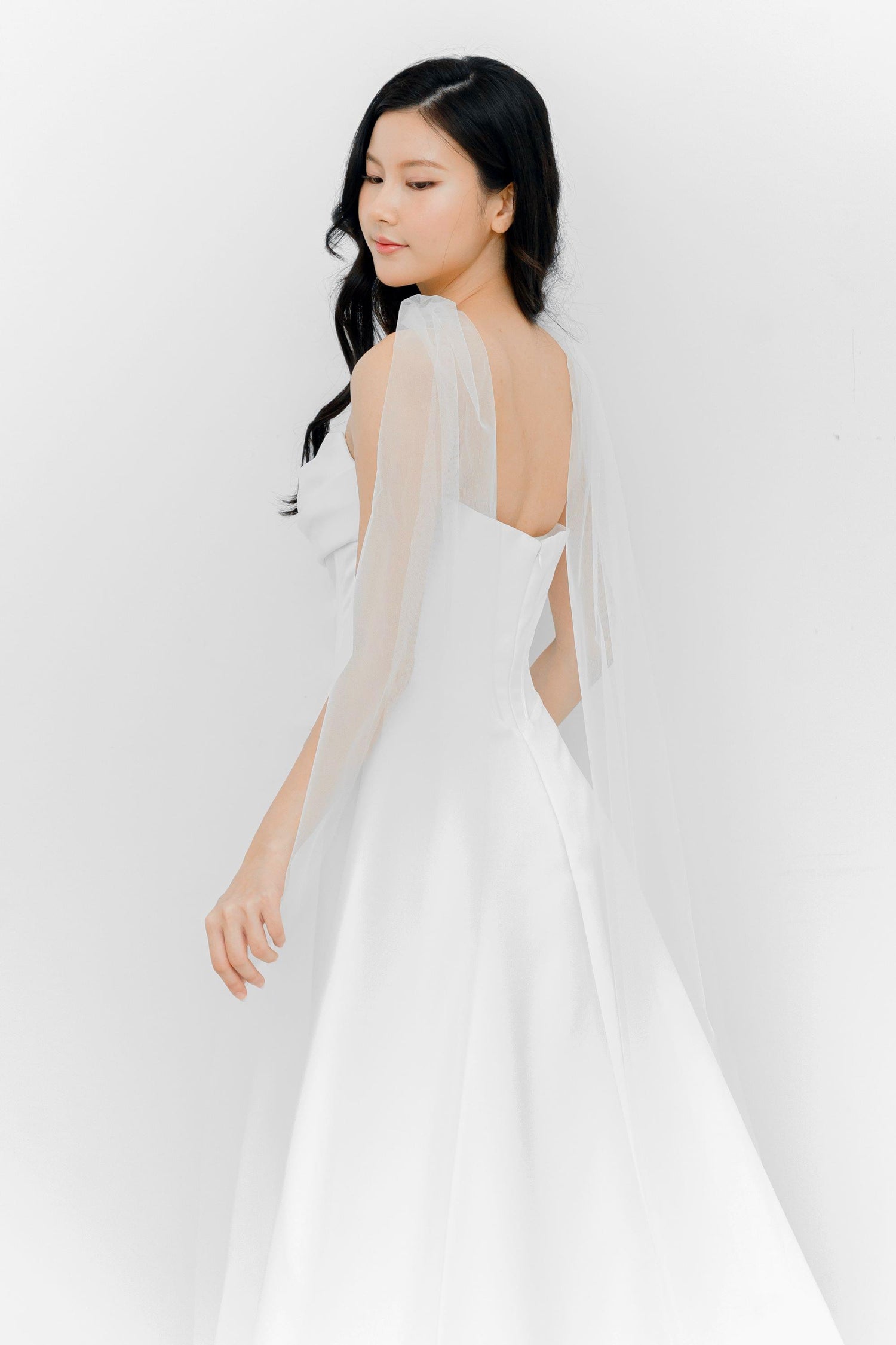 Jovana bridal gown side view showcasing the elegant fitted silhouette