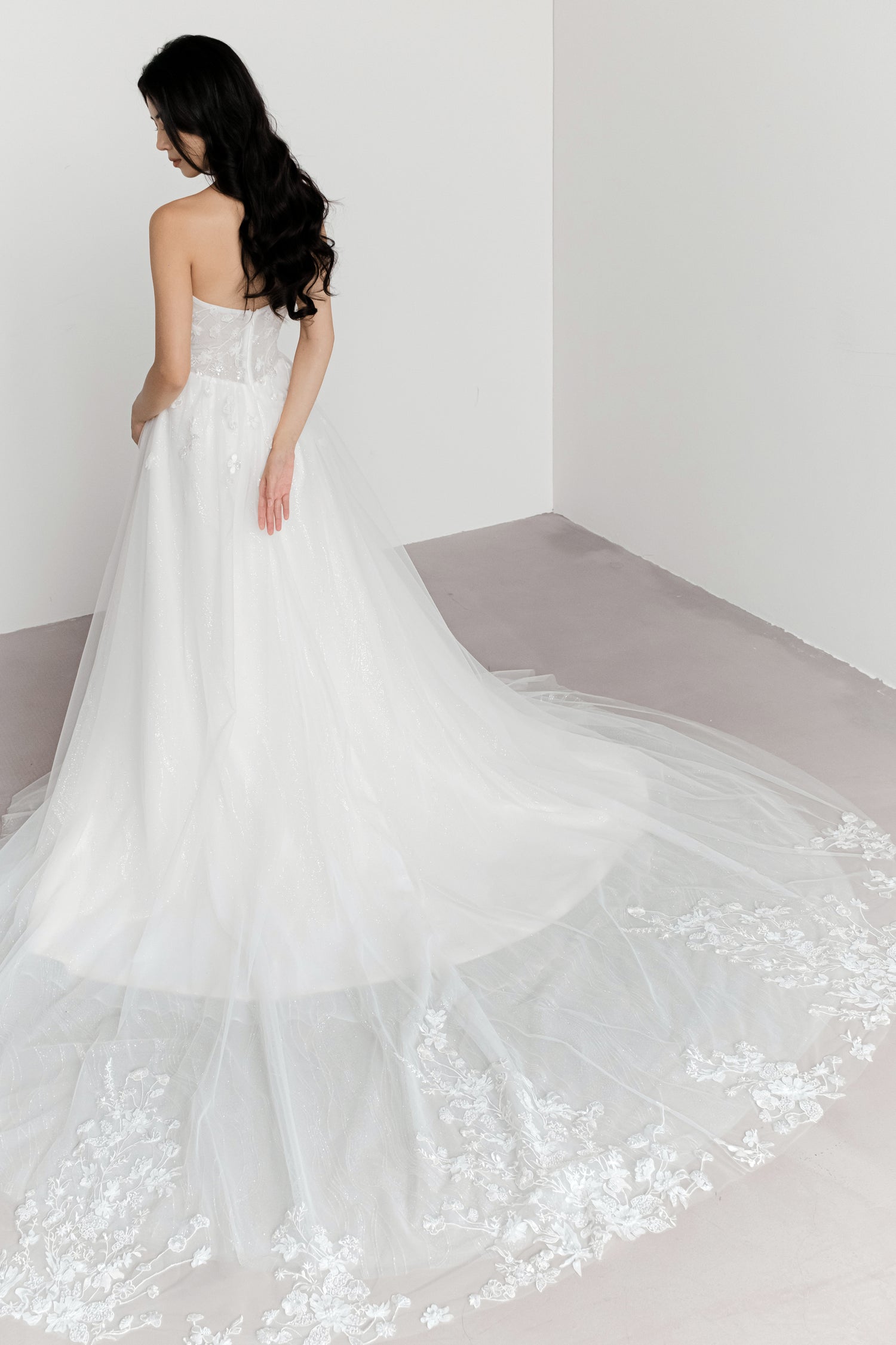 Judith wedding gown train showcasing the delicate beaded lace train