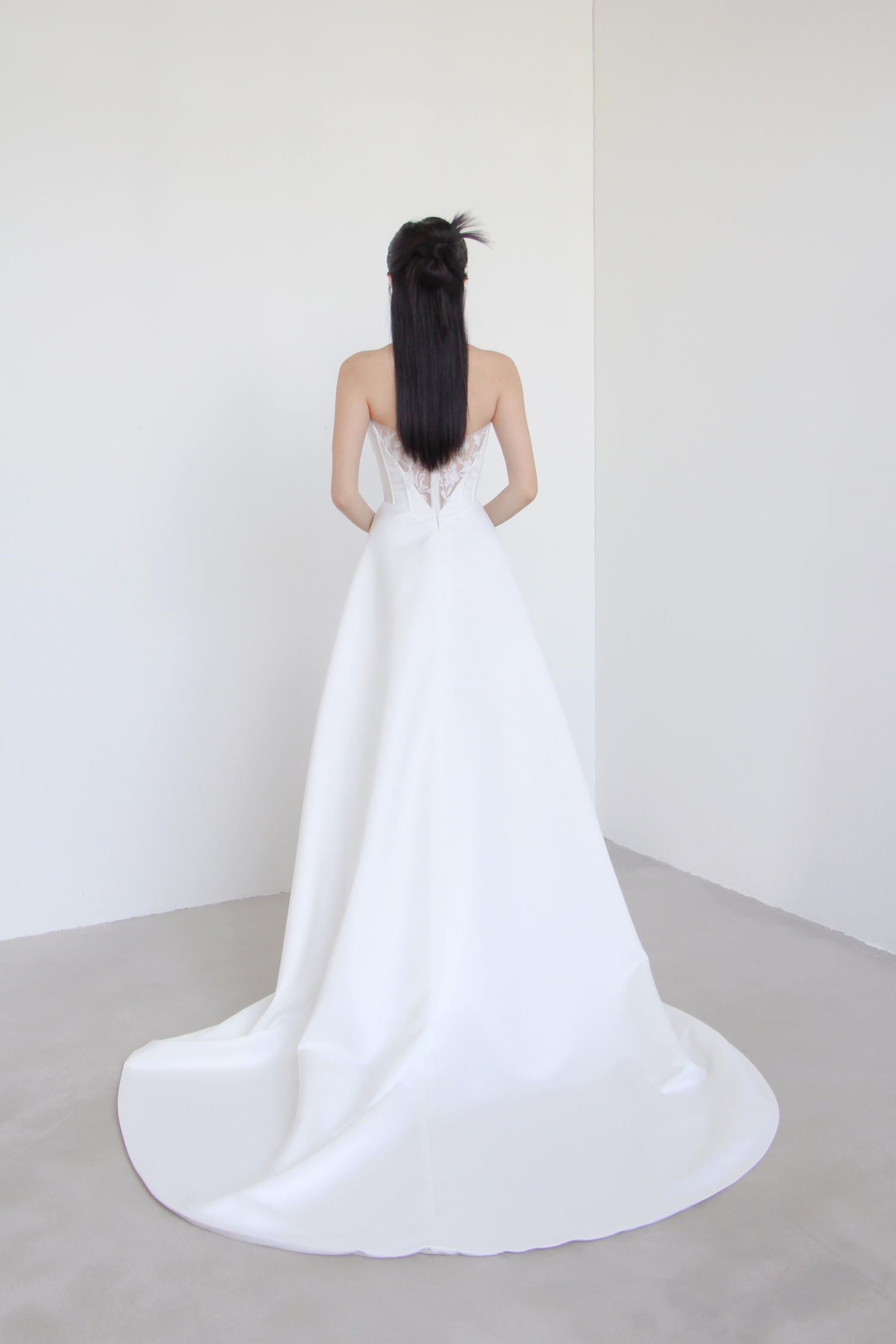 Julee wedding dress back view with elegant peekaboo lace back
