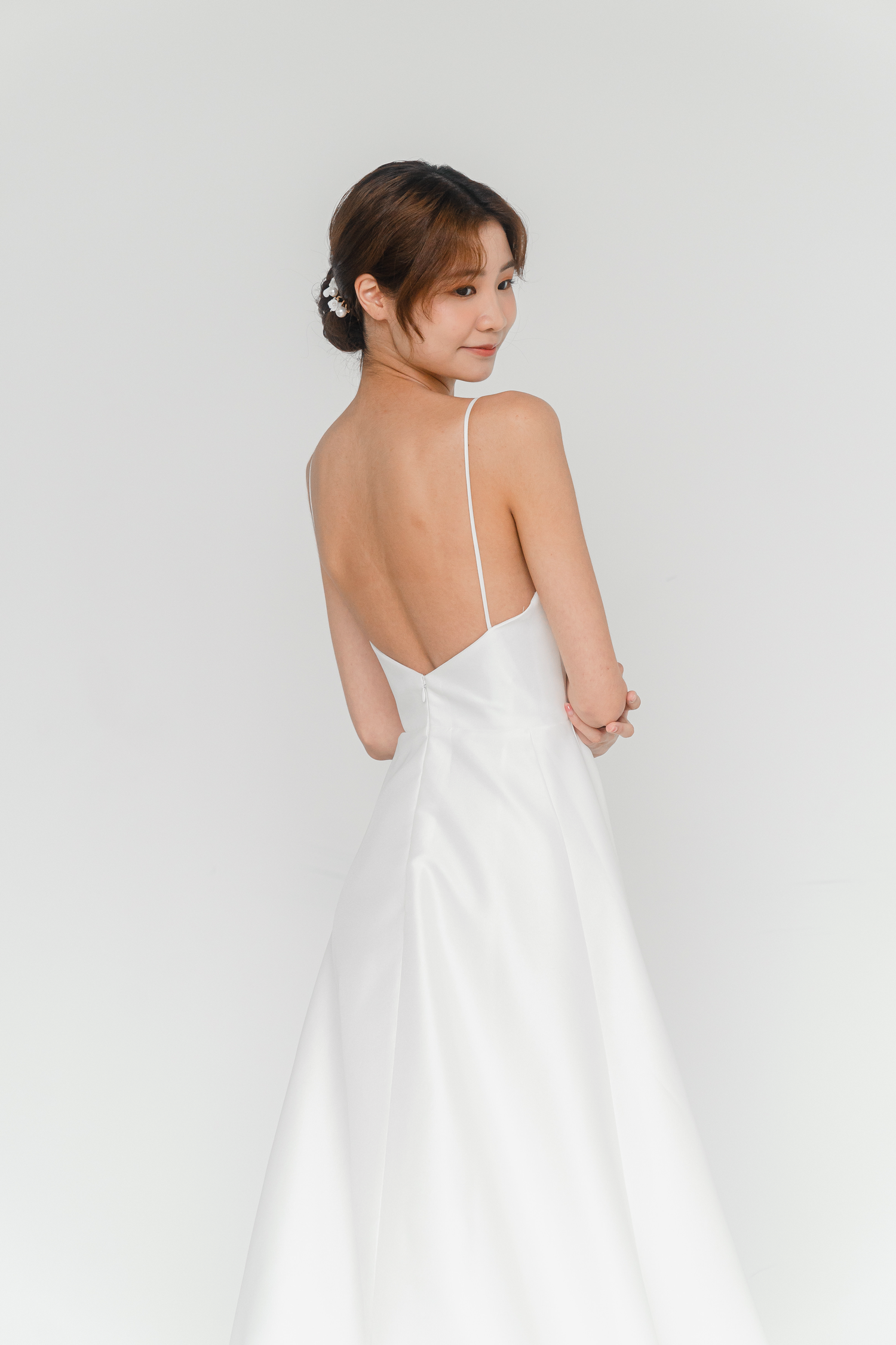 Julia wedding gown side view with a clean fitted silhouette