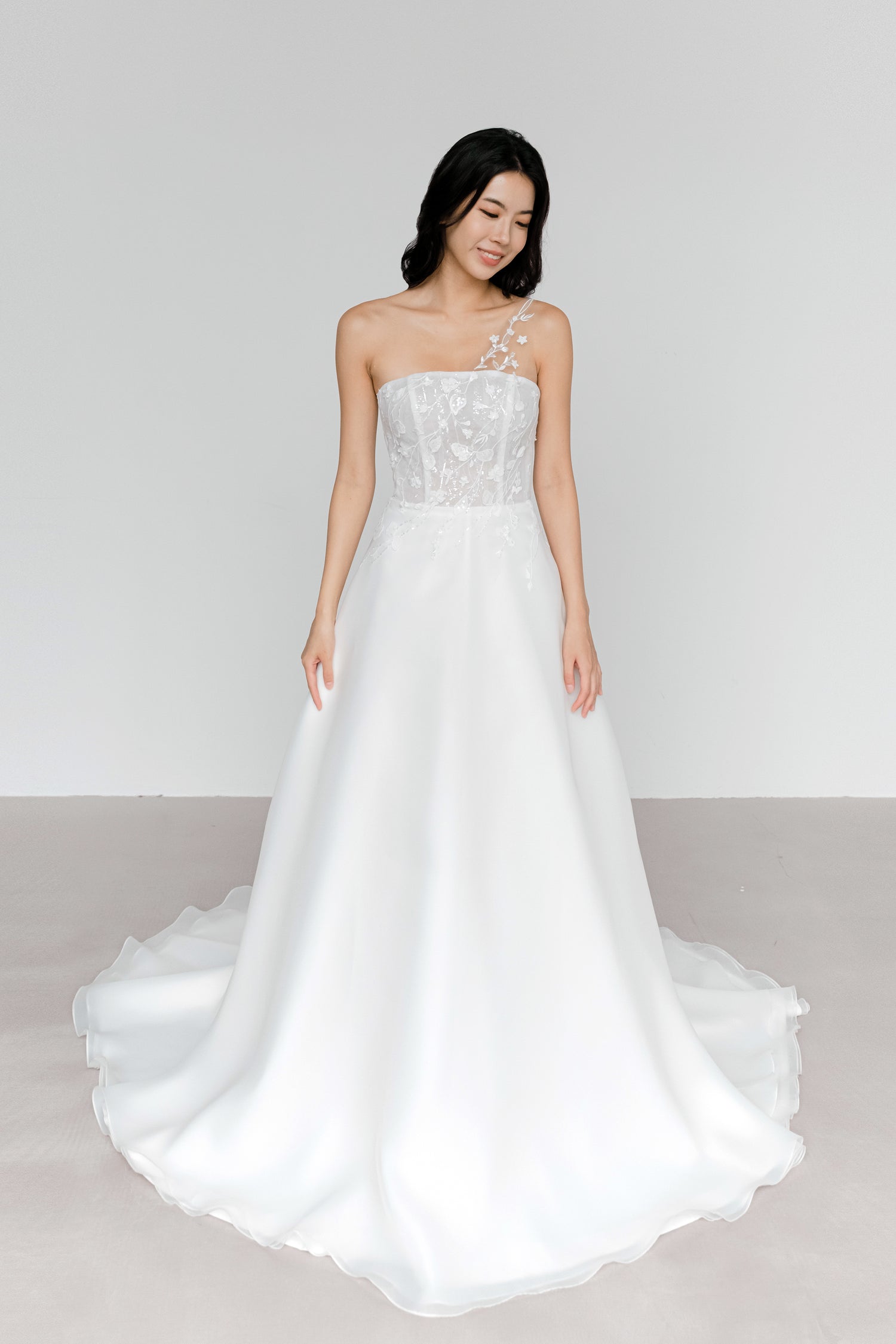 Karla wedding dress featuring a detachable toga sleeve and elegant A-line silhouette